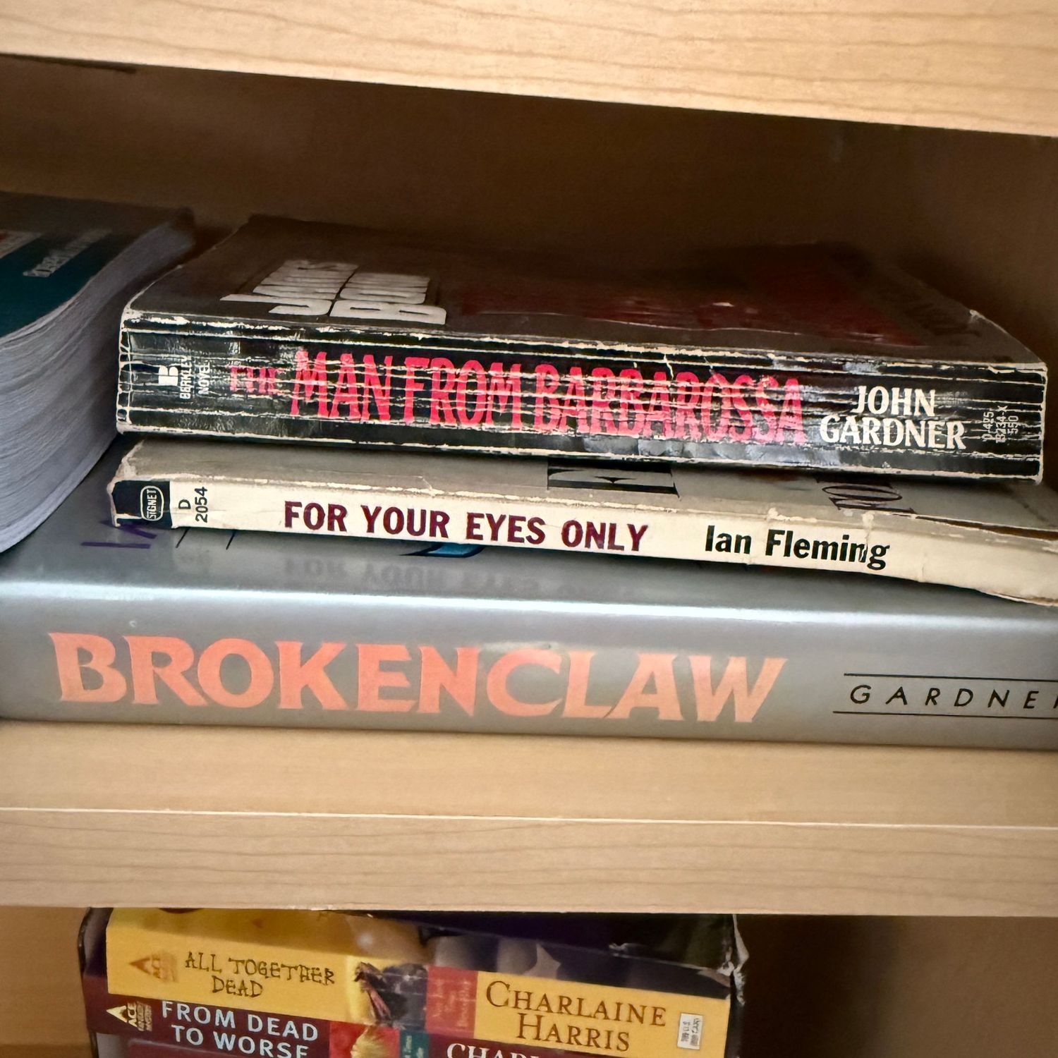 Group of books including For Your Eyes Only