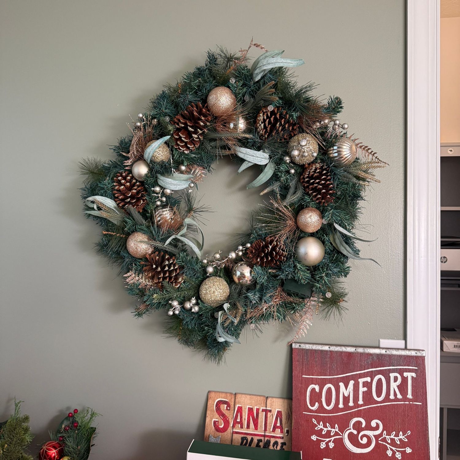 Large pre-lit Christmas wreath (battery-operated) with pine cones, leaves, and berries 32"W