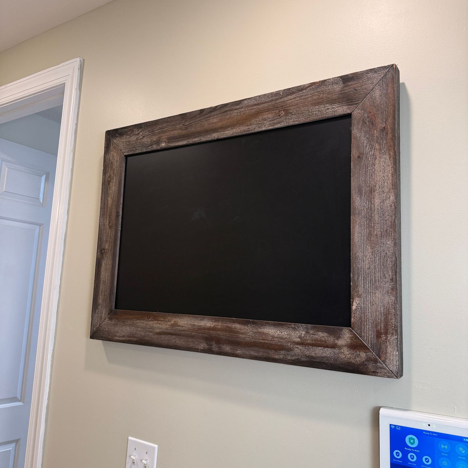 Large chalkboard with plastic barn wood-style frame 27" x 36"