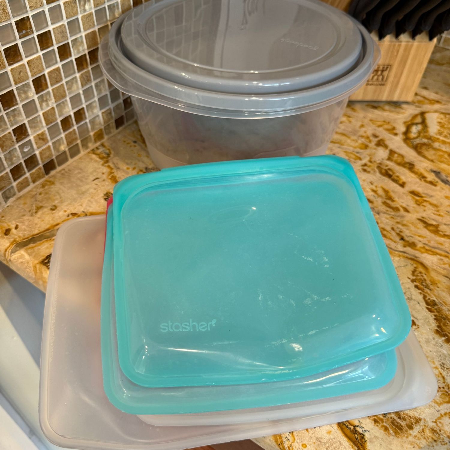 Plastic storage bowl and Stasher reusable storage bags