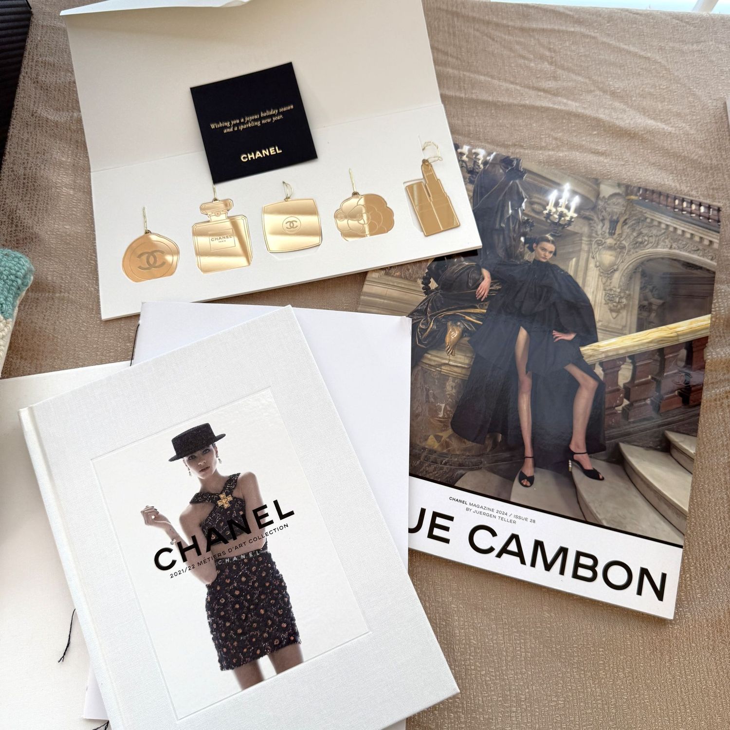Chanel slender ornaments, magazine and Metiers d'art Collection book with sleeve