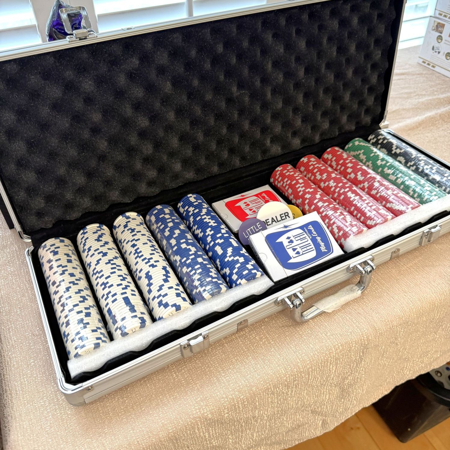 Poker chips and cards new in package and case
