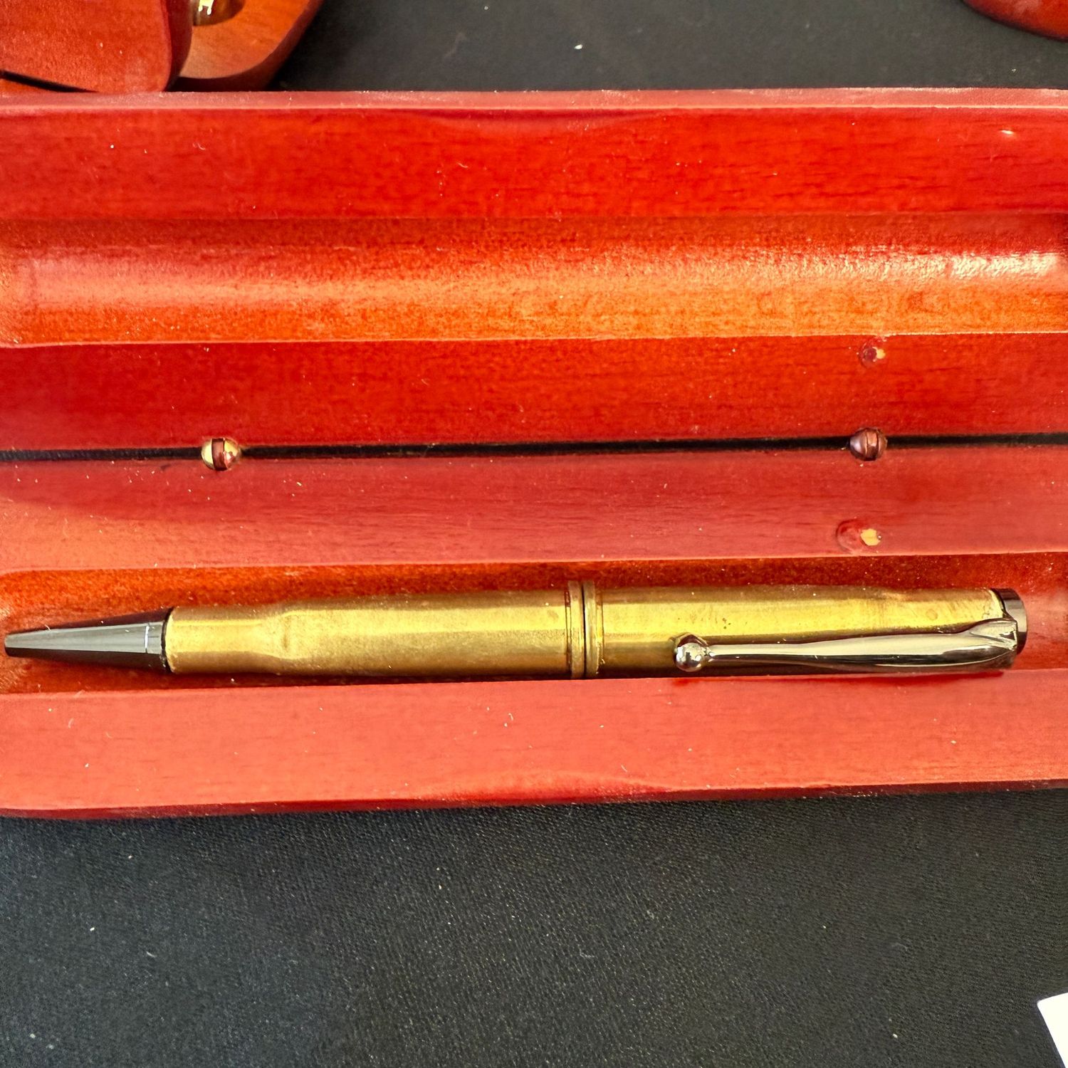 Hand-crafted pen by local artisan (C) bullet casing body