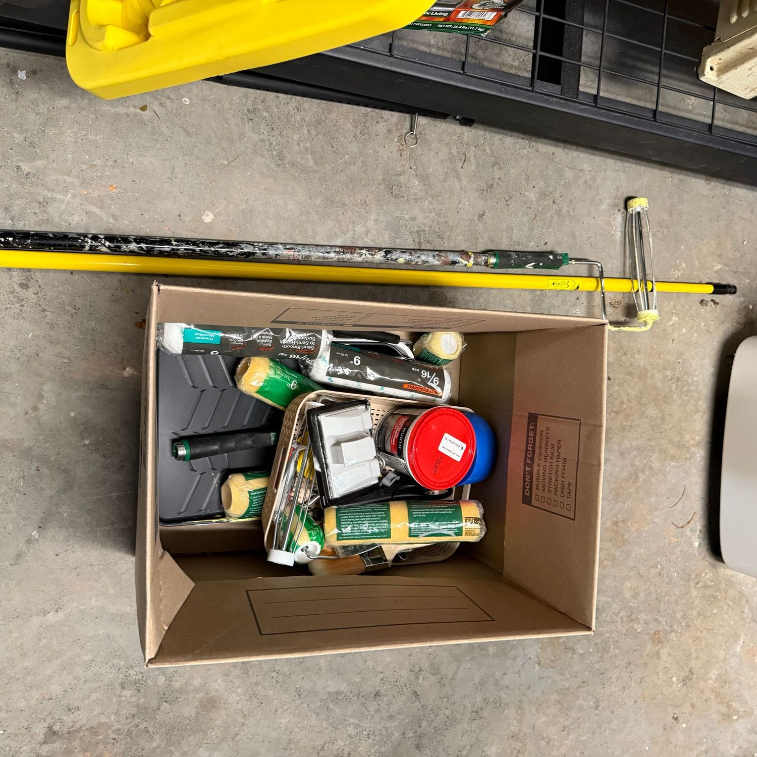 Group of painting supplies, poles, rollers, trays, most are new or nearly new