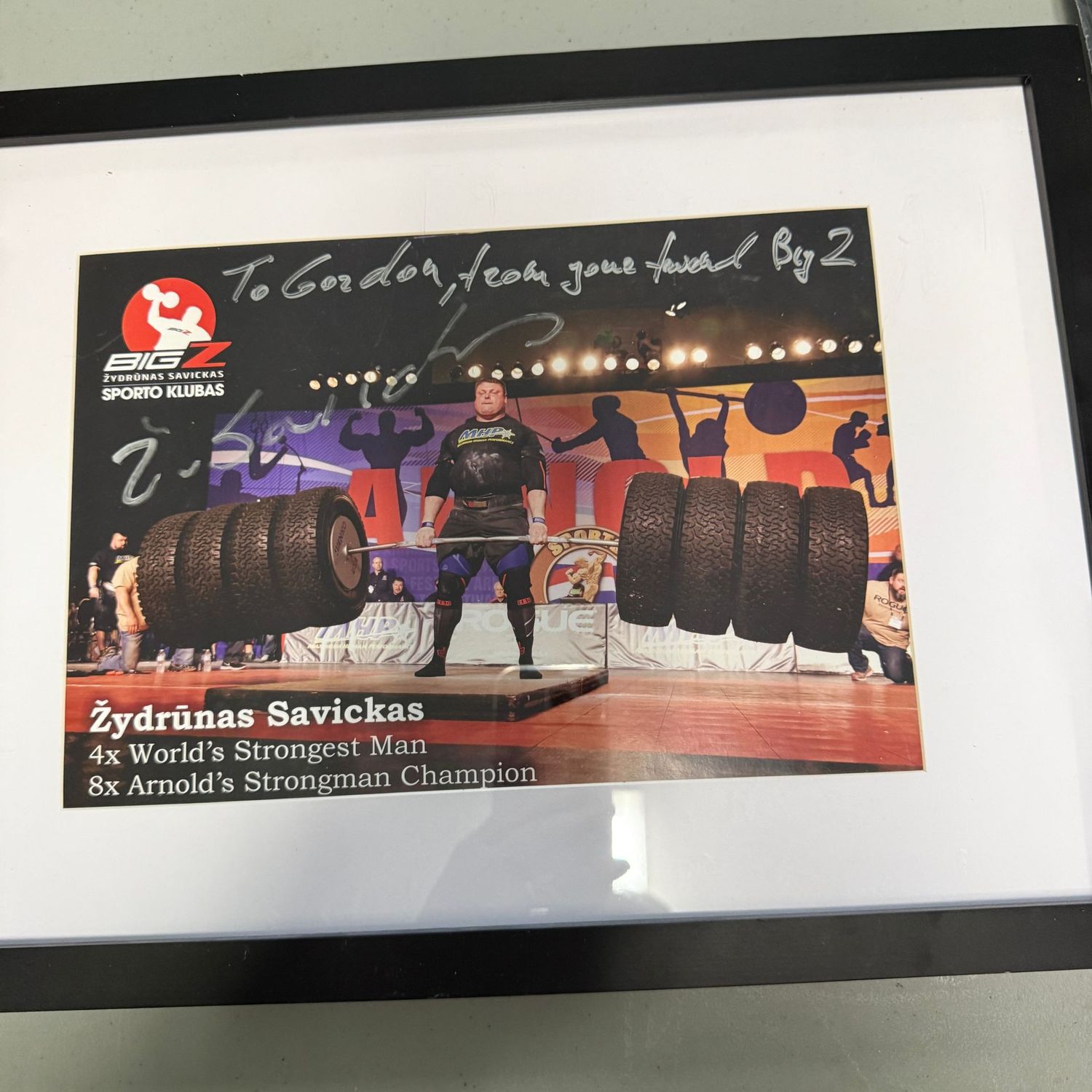 Signed and personalized Zydrunas Savickas strongest man photograph, framed 17" x 13"