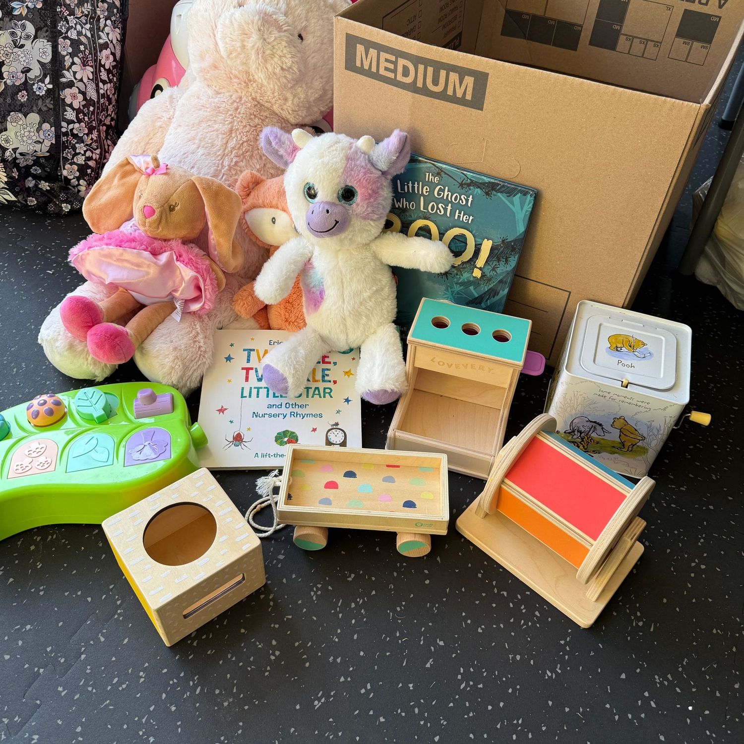 Medium box full of nice toys, wooden, plush, jack in the box
