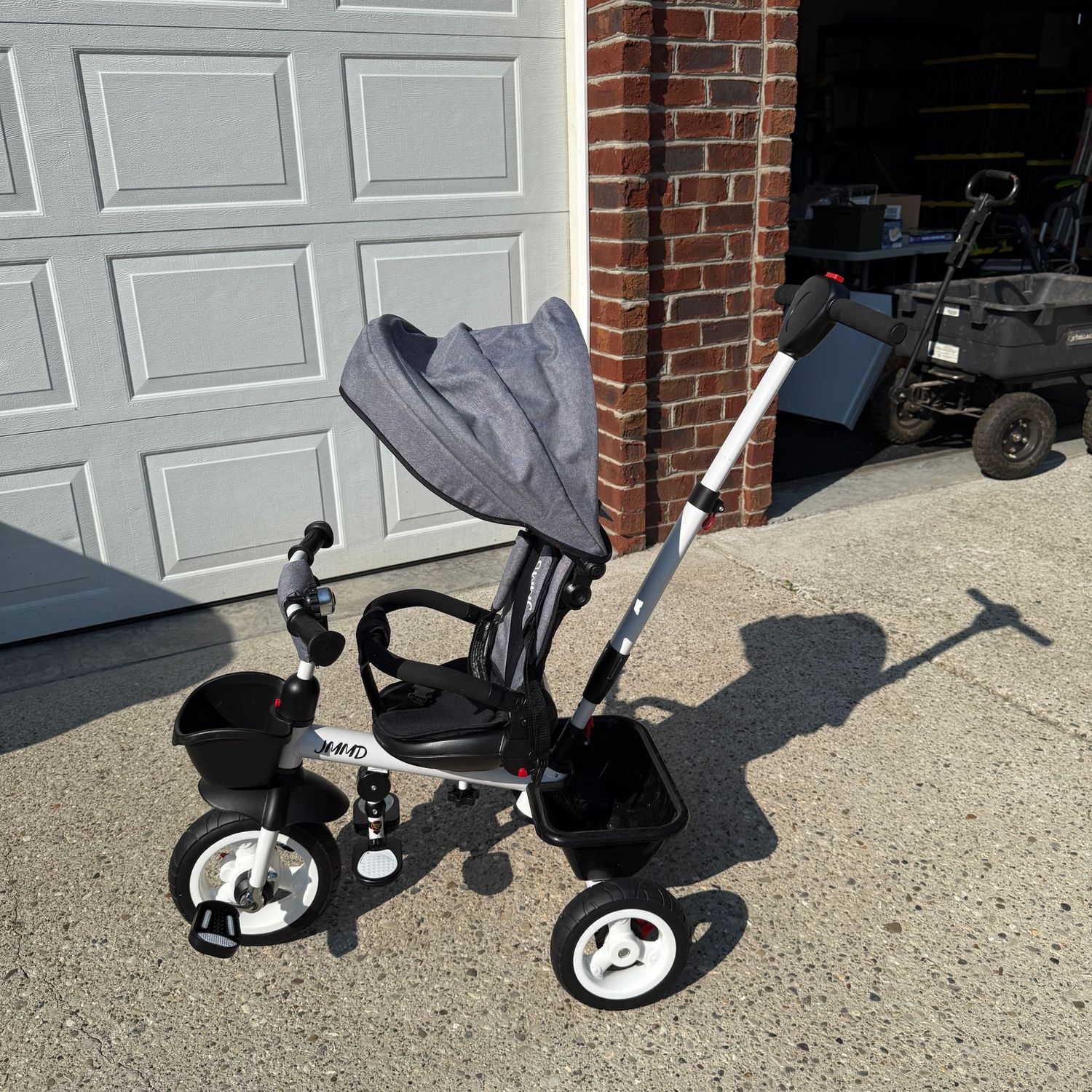 Toddler-size JMMD riding tricycle walker, seat is 11"W,  nice condition