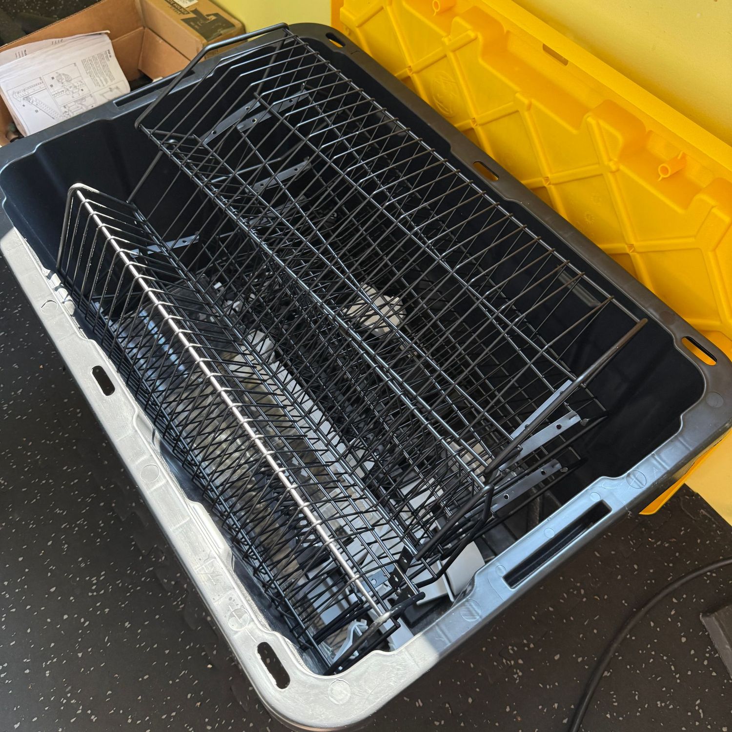 Big plastic bin of wall-mountable CD racks