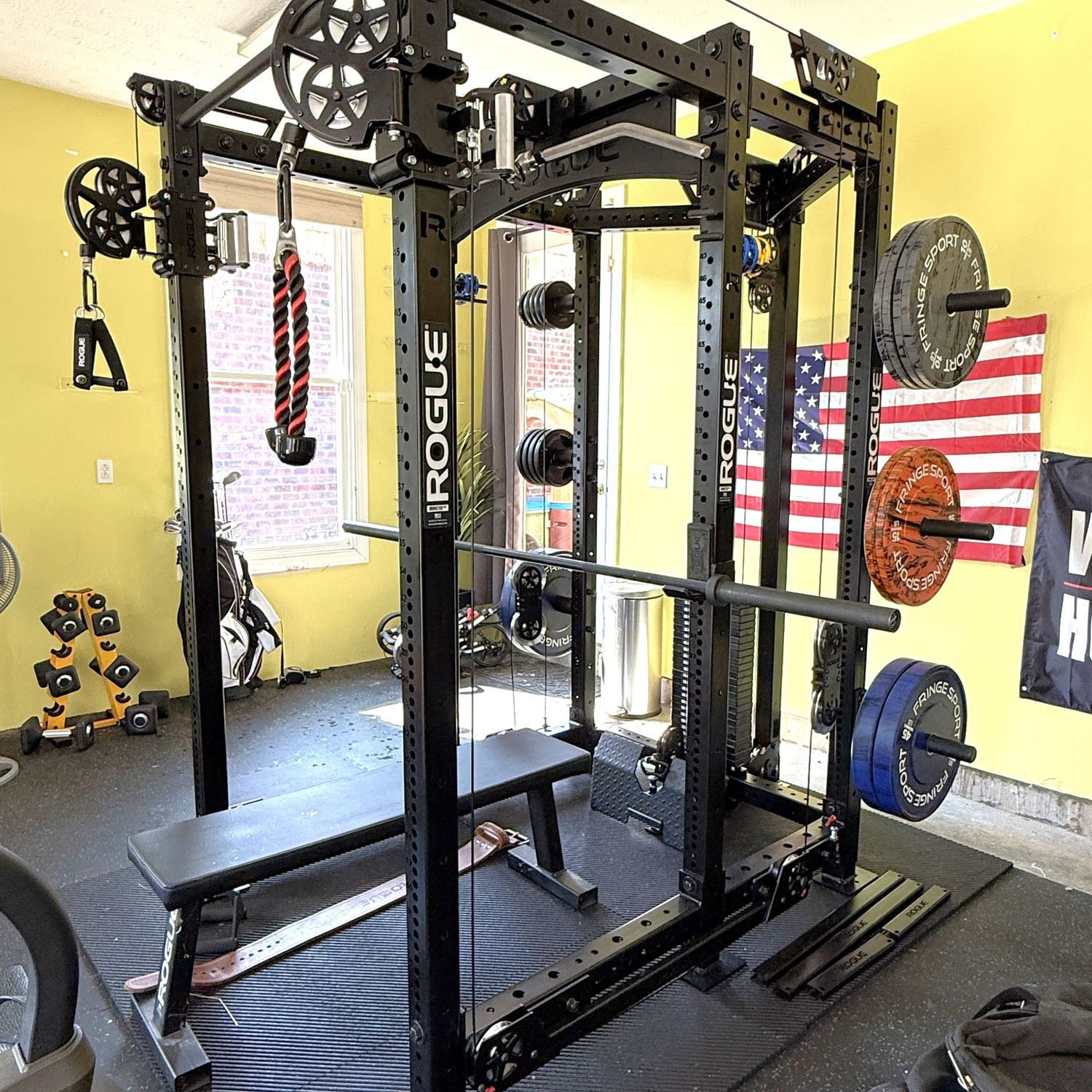 Rogue weightlifting set with all attached weights, pullies, bench, belt, in excellent nearly-new condition 7'8"H x 6'10"L x 6'W