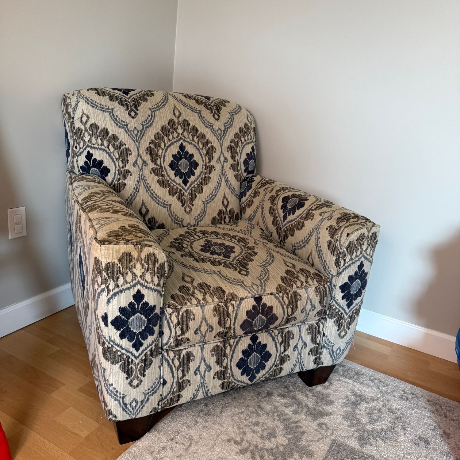Multi-color armchair, does have a few fabric pulls, very comfortable  35"D x 35"W