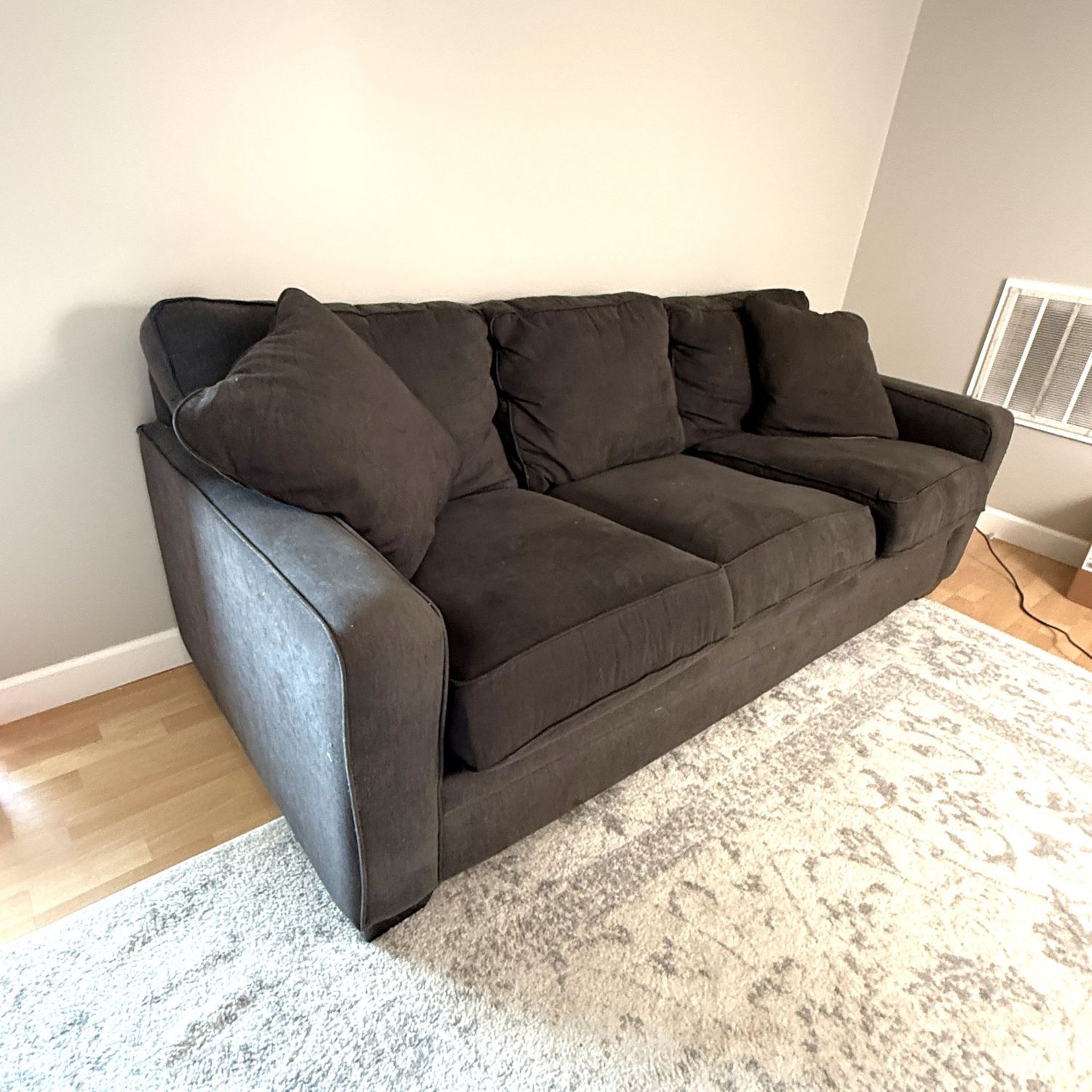 The Lazyboy 'I need a very comfortable couch' that needs some cleaning, has some pulls, accent pillows need some sewing, and you are willing to carry it downstairs 7 ft. long and 35 in. deep