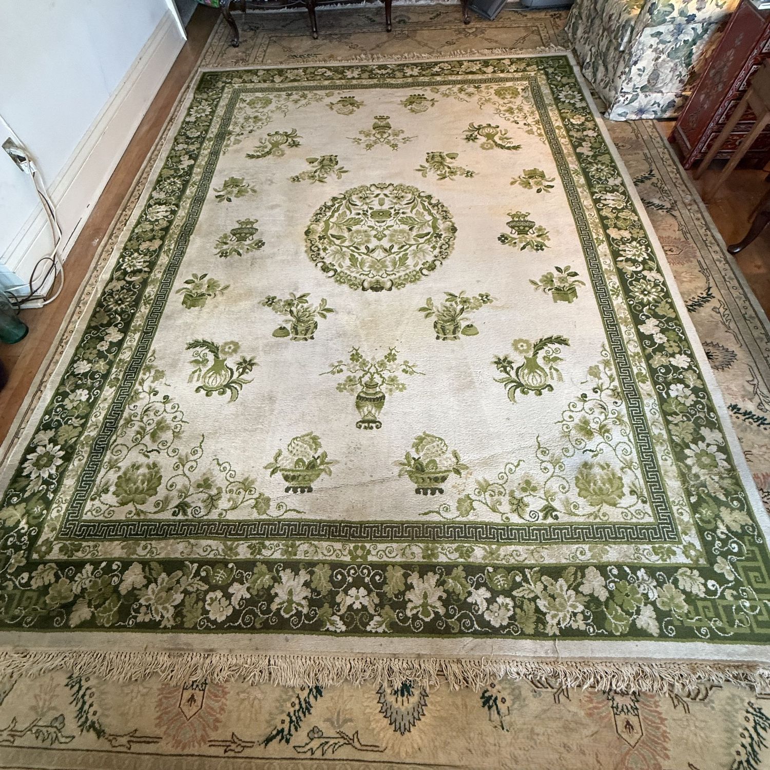 Oriental Handwoven Cream & green floral medallion and border, Rug, needs thoroughly cleaned, one 8-10"in area with moisture damage, shows tears in that area, some large stains (see photos) 8'5" x 11'3