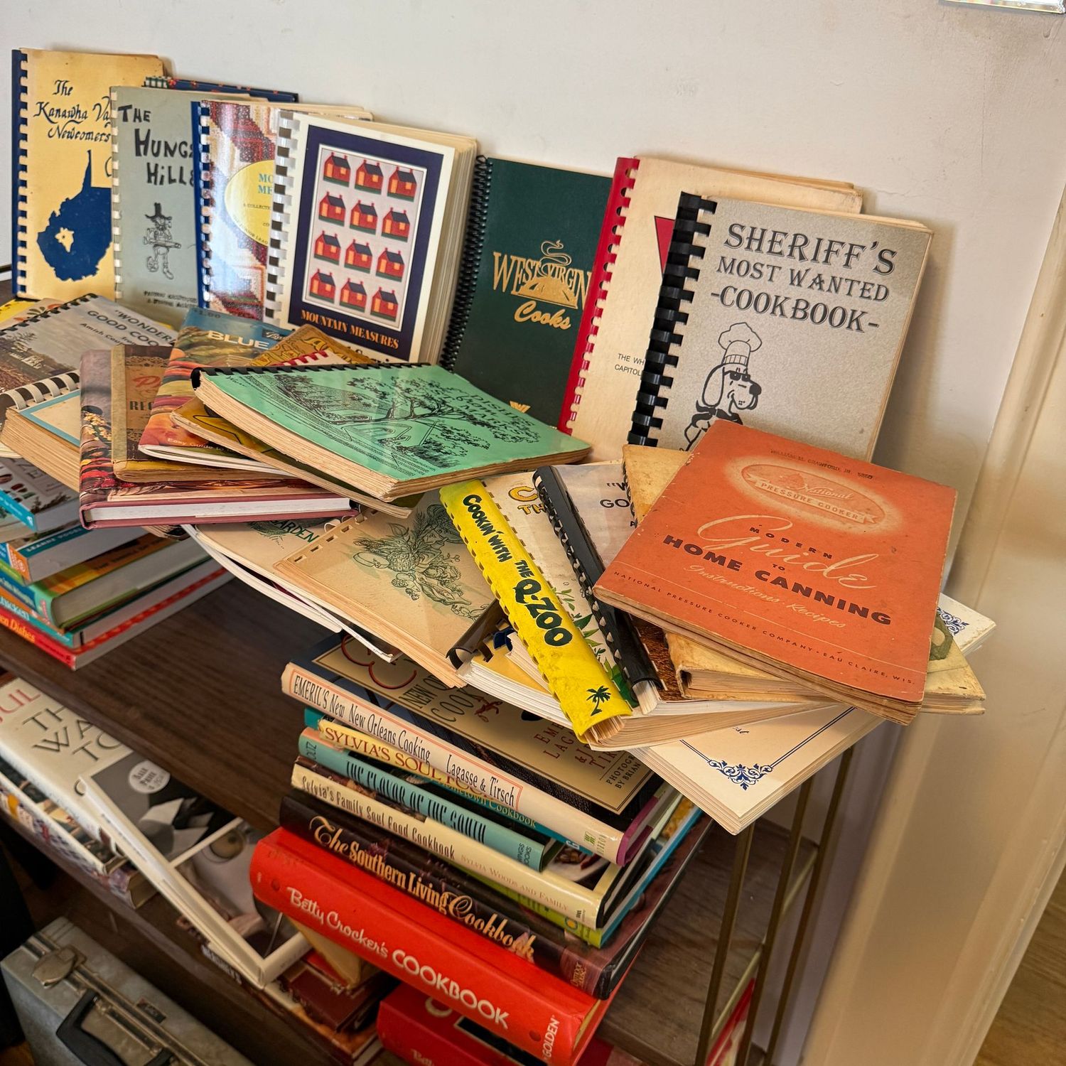 Box Lot 20: Cooking, Spiral cookbooks (seen on top shelf)