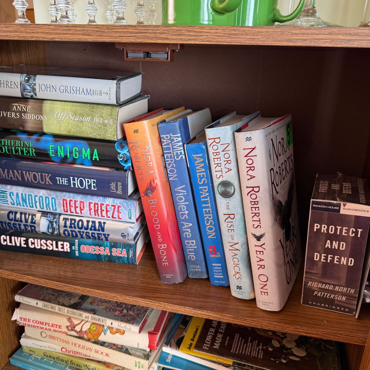 Shelf of books including Enigma and Year One Shelf of books including Enigma and Year One