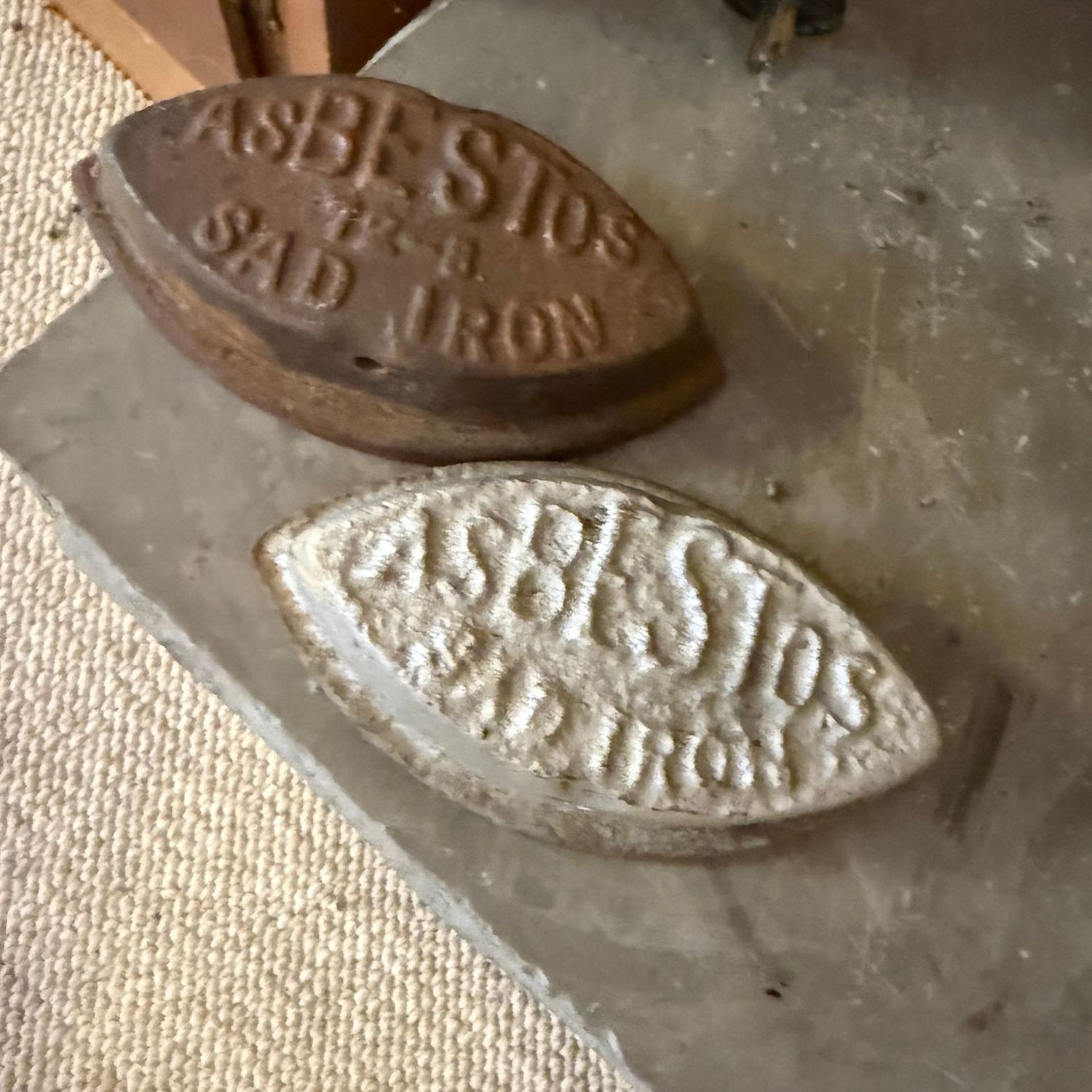 Two cast iron Asbestos-brand sad irons Two cast iron Asbestos-brand sad irons