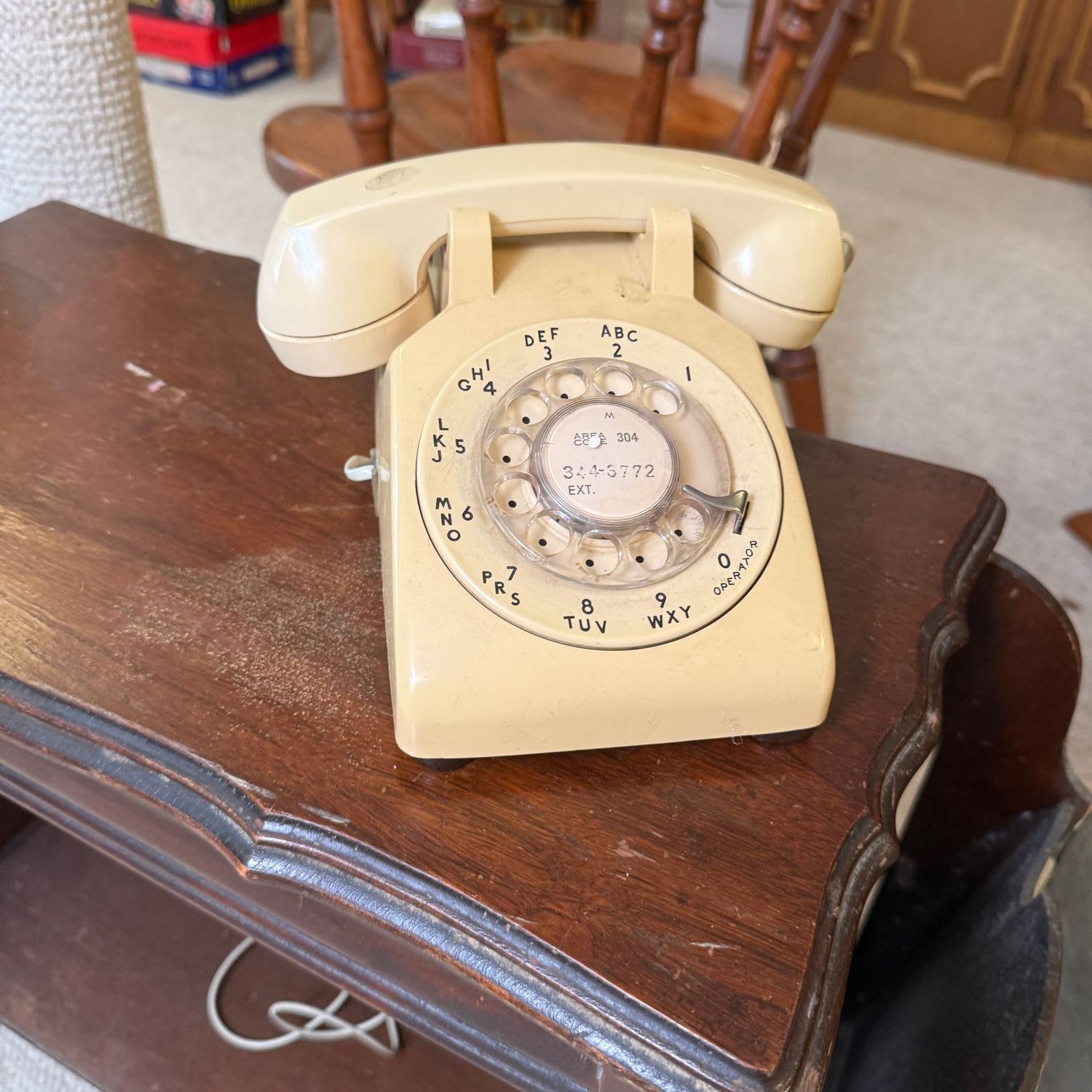 Cream-color rotary phone Cream-color rotary phone