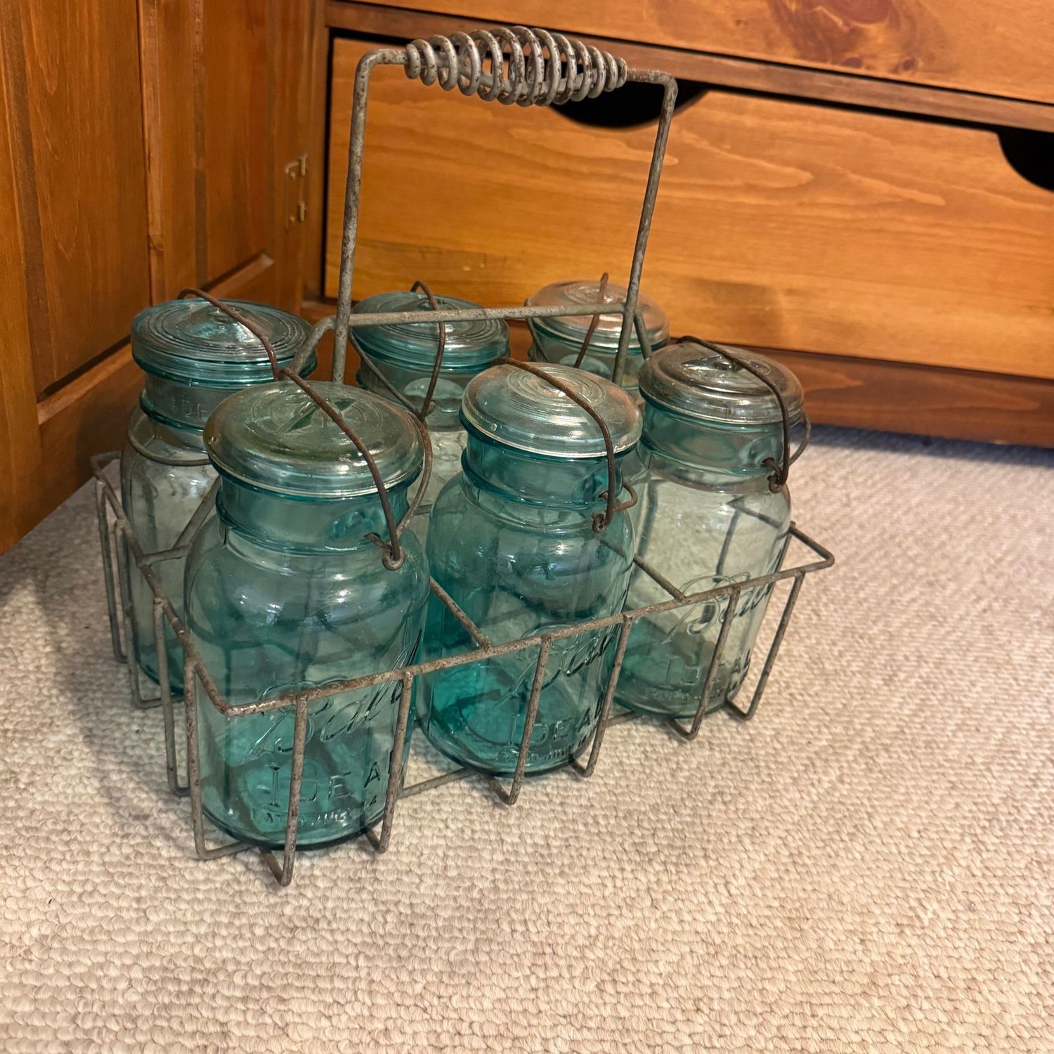Ball canning jars, blue, with some blue and some clear lids, in carrier Ball canning jars, blue, with some blue and some clear lids, in carrier