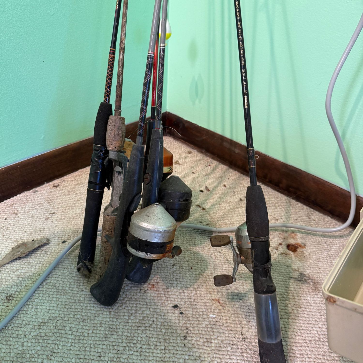 Group of vintage fishing poles Group of vintage fishing poles