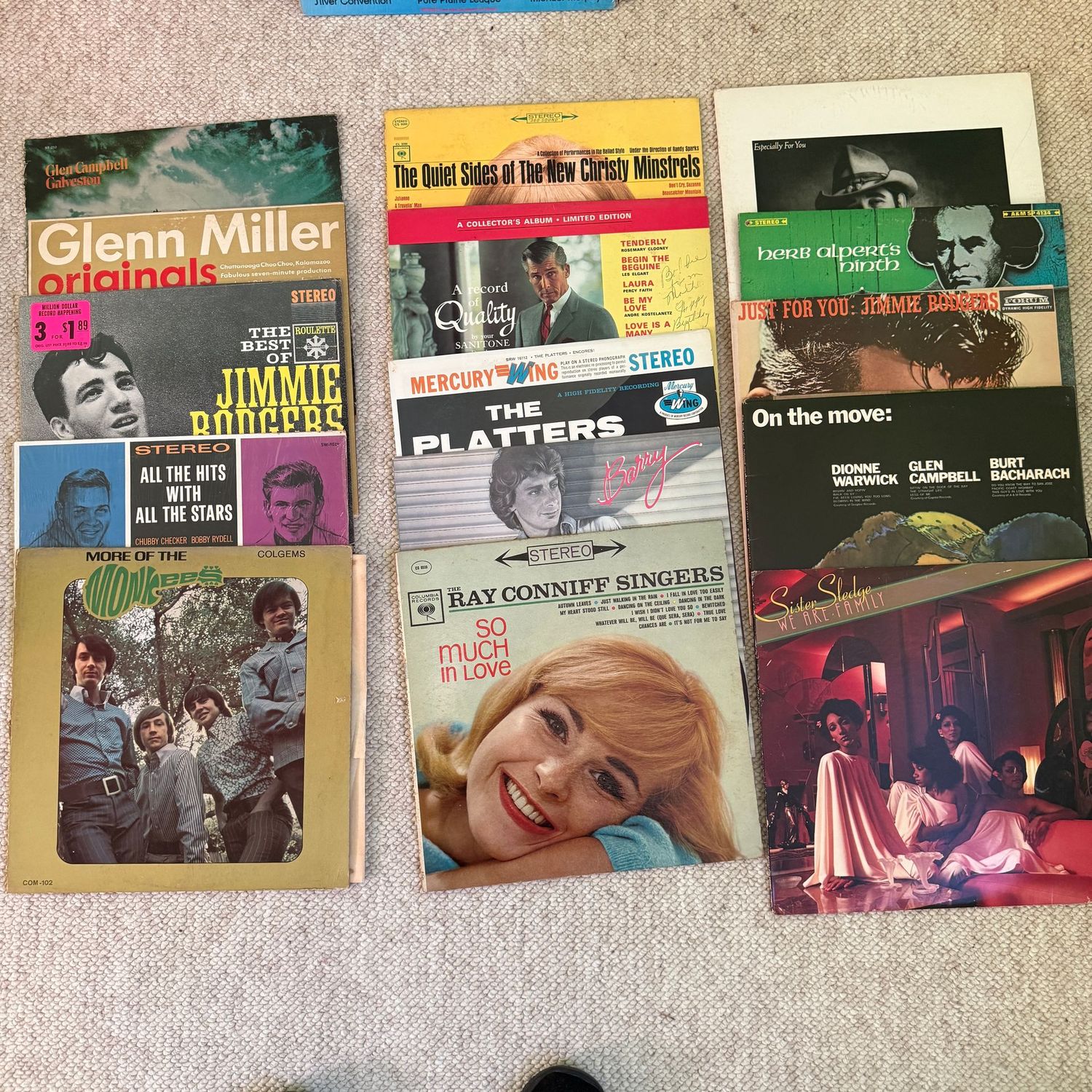 Group of record albums, some wear, including More of the Monkees Group of record albums, some wear, including More of the Monkees