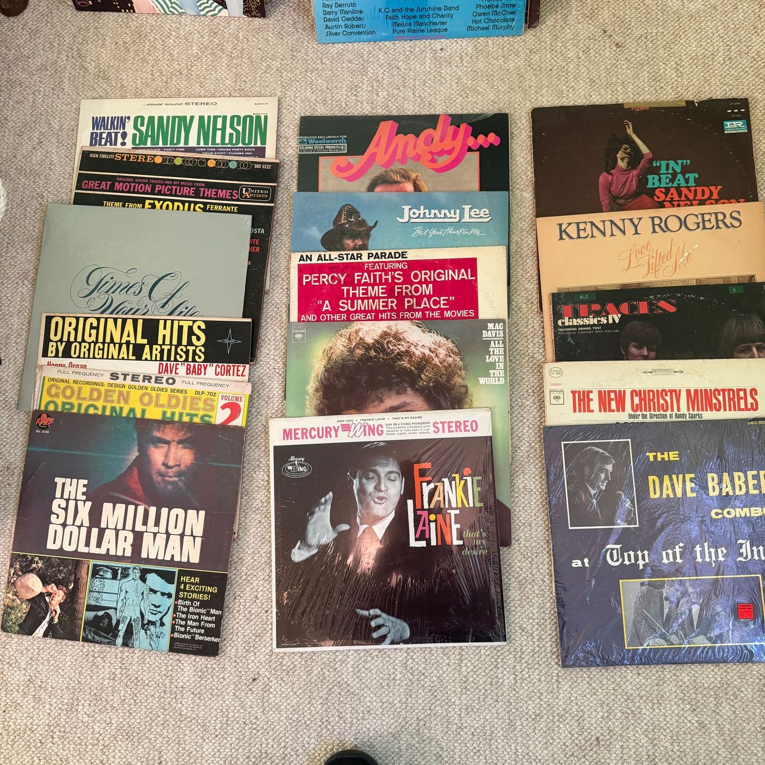 Group of record albums, some wear, including The Six Million Dollar Man Group of record albums, some wear, including The Six Million Dollar Man