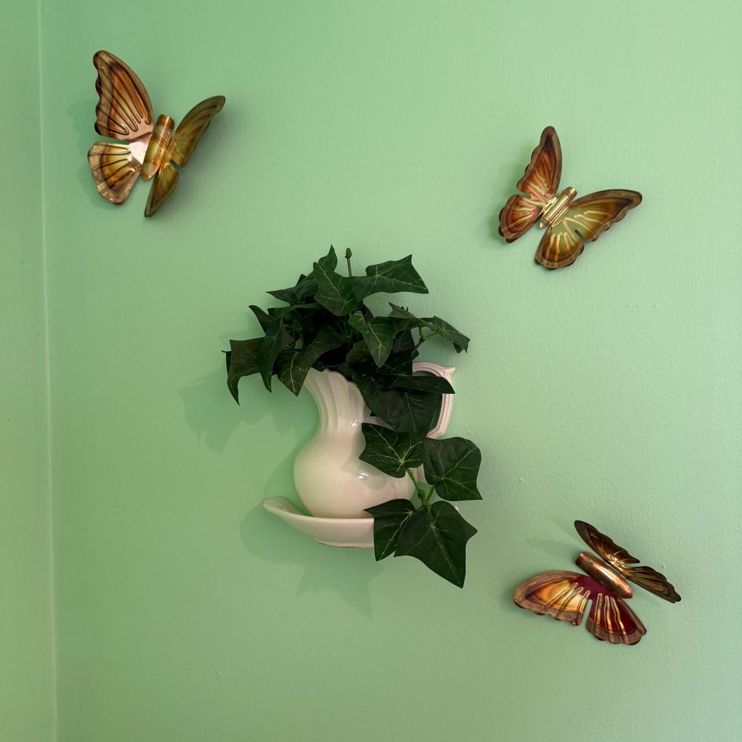 Vintage ceramic wall pocket planter and metal butterflies Vintage ceramic wall pocket planter and metal butterflies