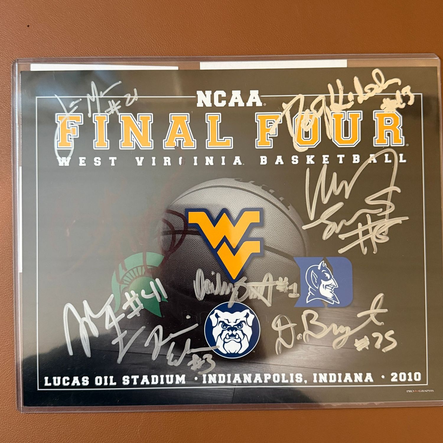 Autographed 8x10 #7, 2010 Final Four WVU basketball logo with multiple signatures