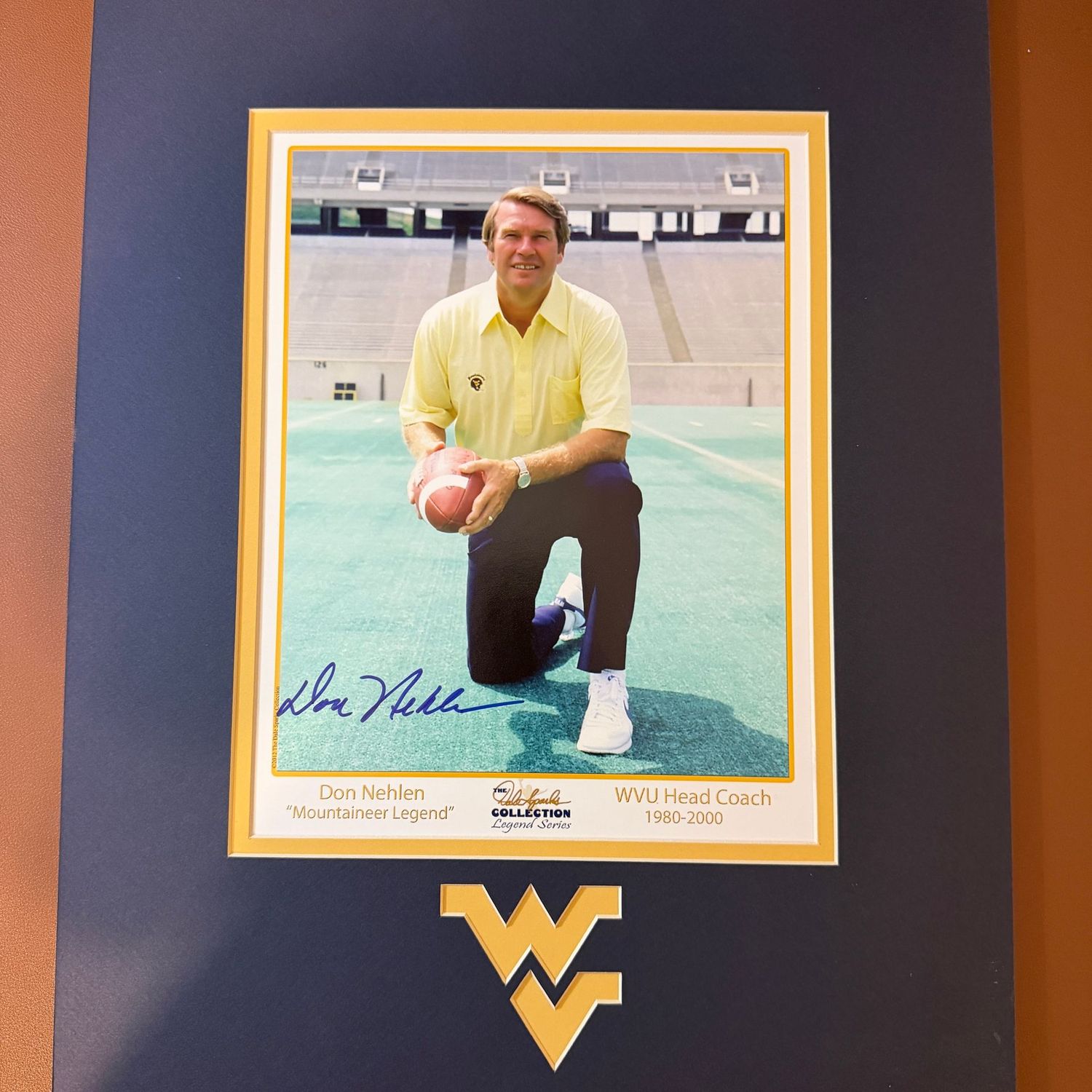 Autographed 8x10 with 11x14 WVU matting #88 Don Nehlen