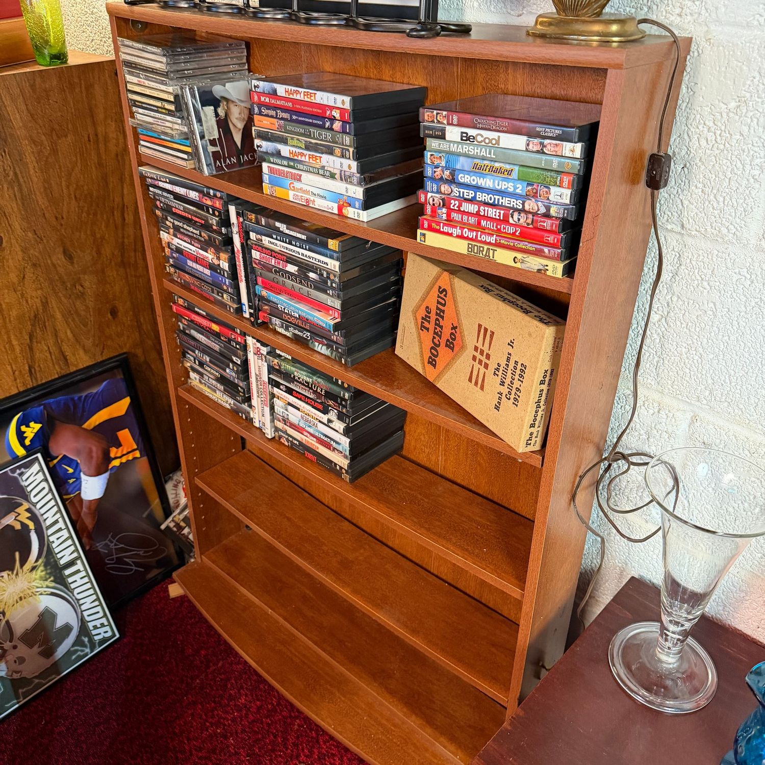 CD/DVD storage shelf, some wear, minor bowing to shelves, heavy (This item is in the lower level) 46"H x 33"W x 8"D