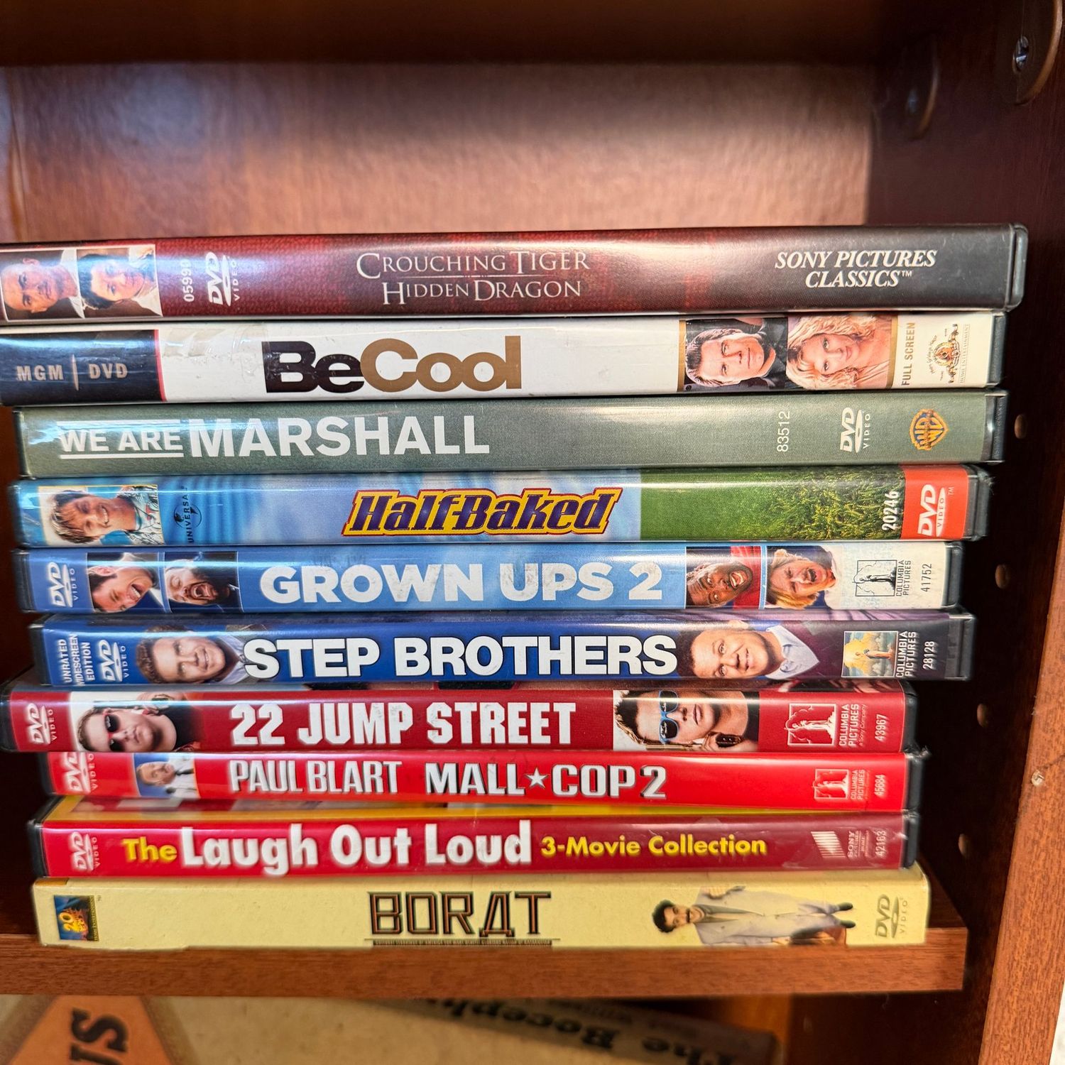 Group of DVDs, mostly comedy