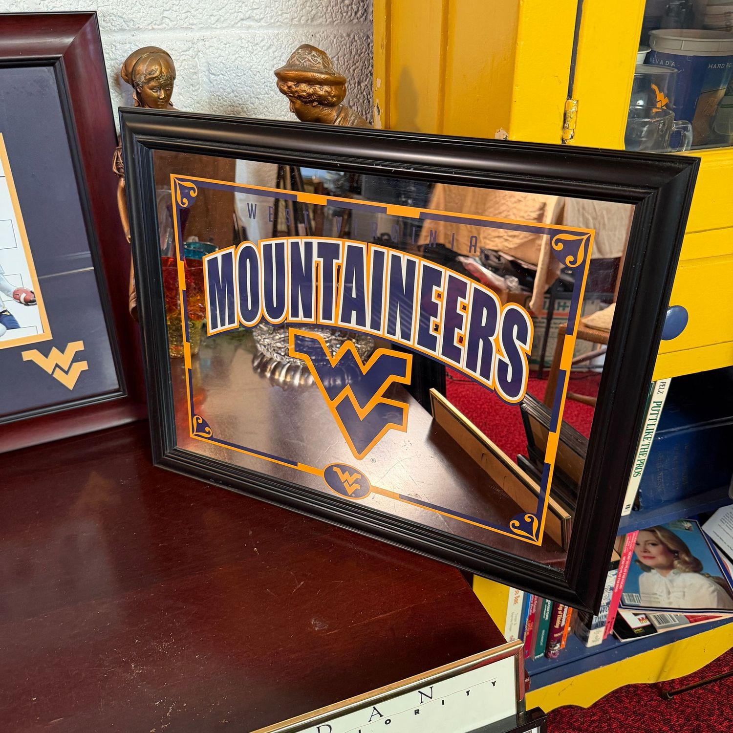 WVU Mountaineers mirror with Flying W logo, plastic frame, 22.8" x 17.9"