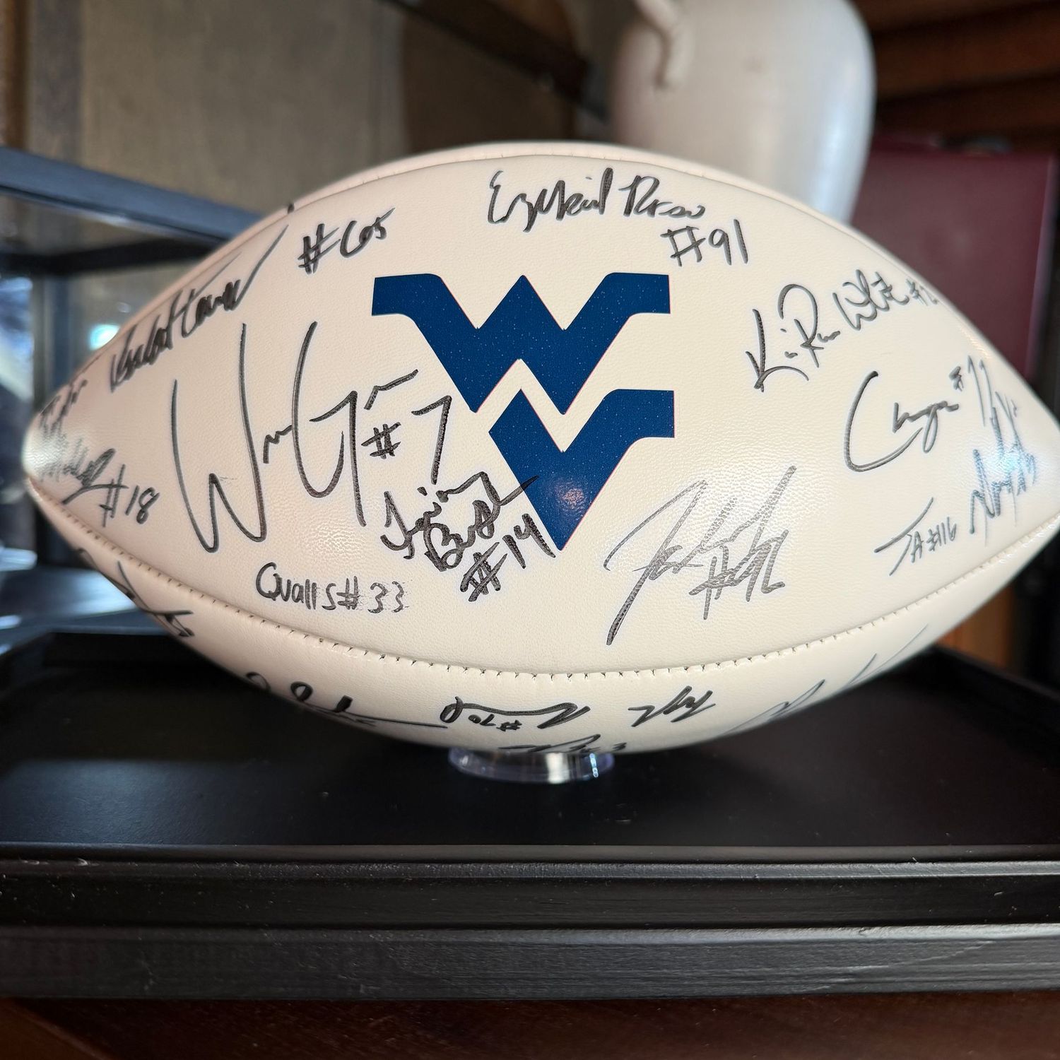Football in case #3 multiple signatures including Will Grier, Quondarius Qualls, Ka'Raun White, and more