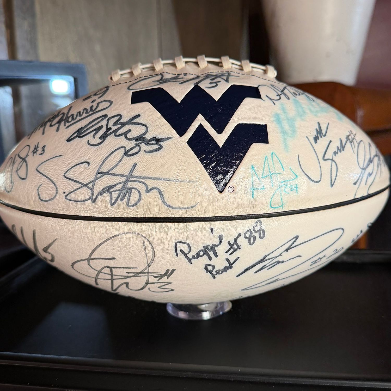 Football in case #2 WVU multiple signatures including Major Harris, Owen Schmitt, Geno Smith, Darryl Talley, Reggie Rembert, Don Barclay, Clint Trickett, Tavon Austin, Shaquille Riddick (See Desc.)