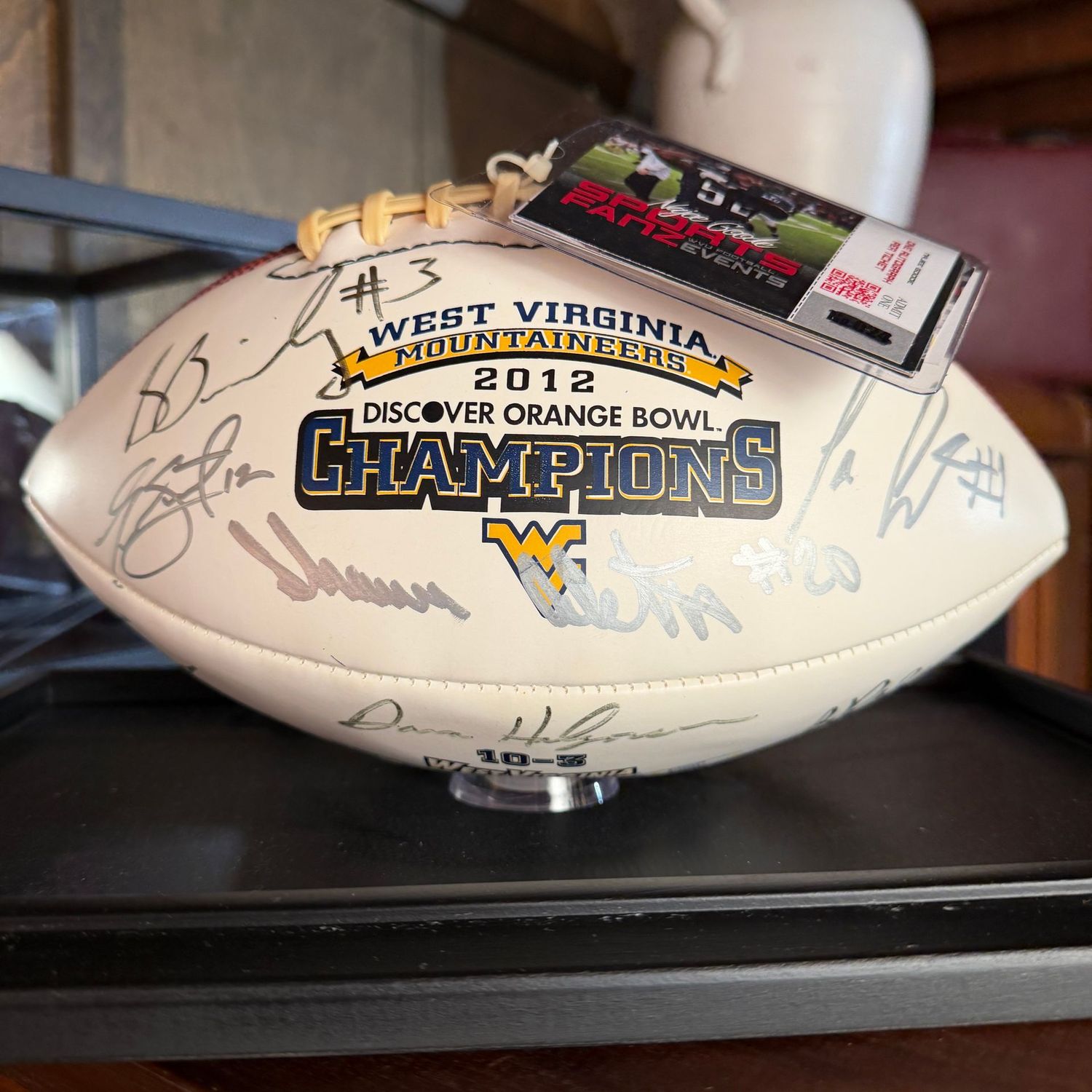 Football in case #4 WVU 2012 Orange Bowl multiple signatures including Stedman Bailey, Shawne Alston, Geno Smith, Najee Goode, and more