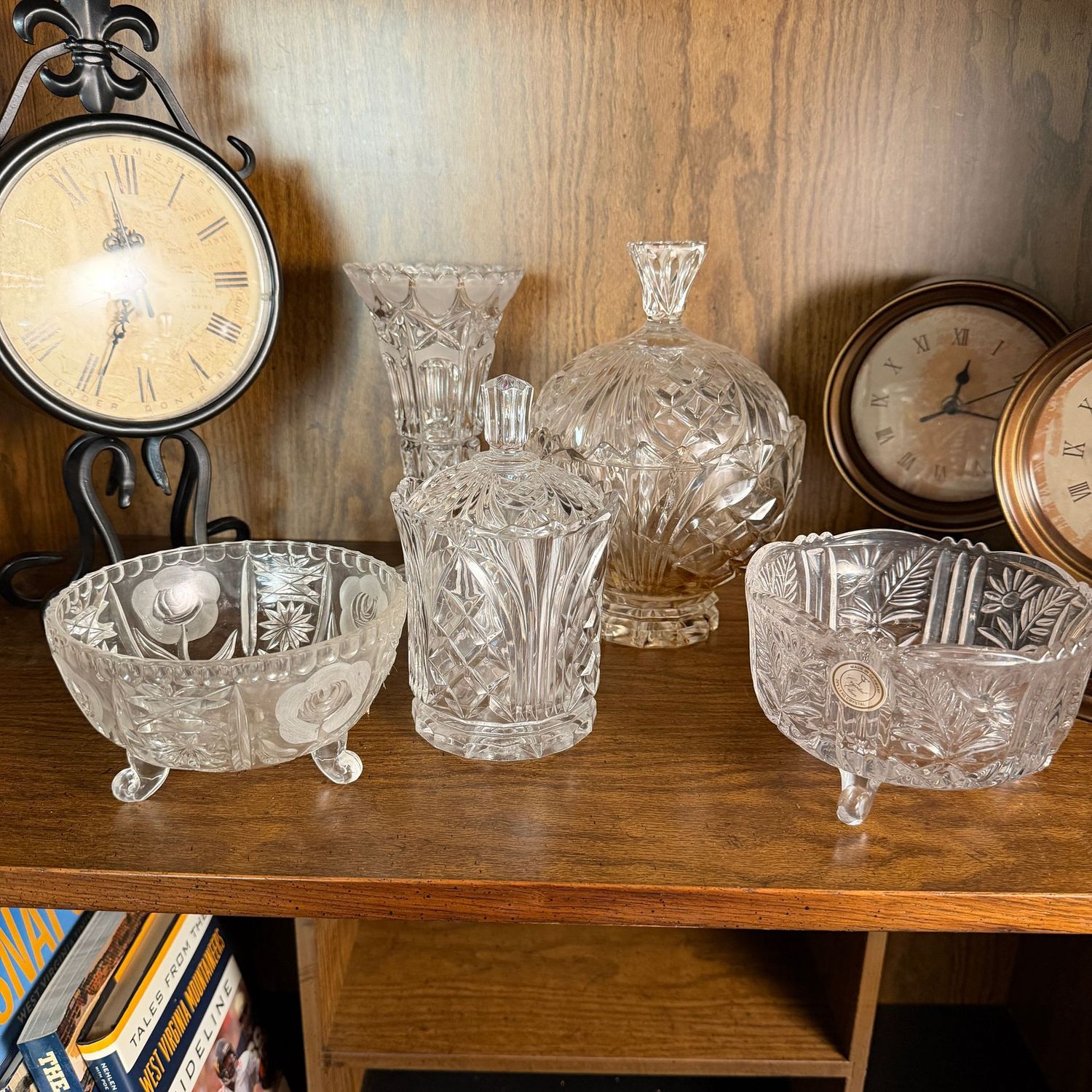 Group of etched, cut, and pressed crystal vase, covered candy jars, and footed candy bowls, the tallest is 8"H