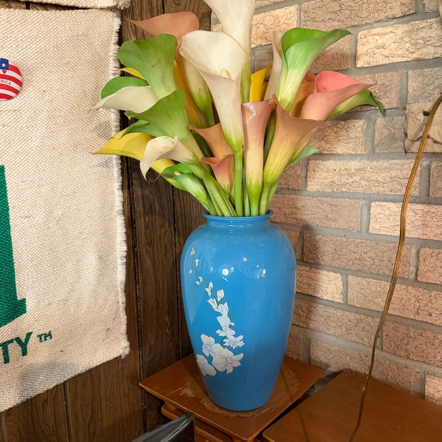 Large blue floral glass vase, 12"H, with plastic lilly arrangement (needs some cleaning)