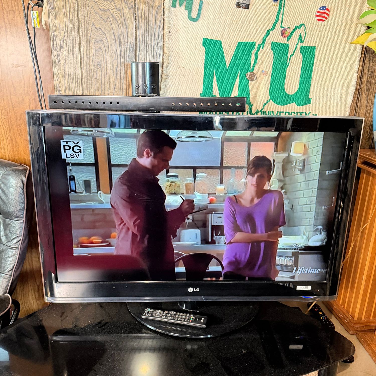 LG TV, 42", 2009 model 42LH40-UA, works well, has a controller, buttons on side of TV, needs some cleaning (This item is heavy & in the lower level)