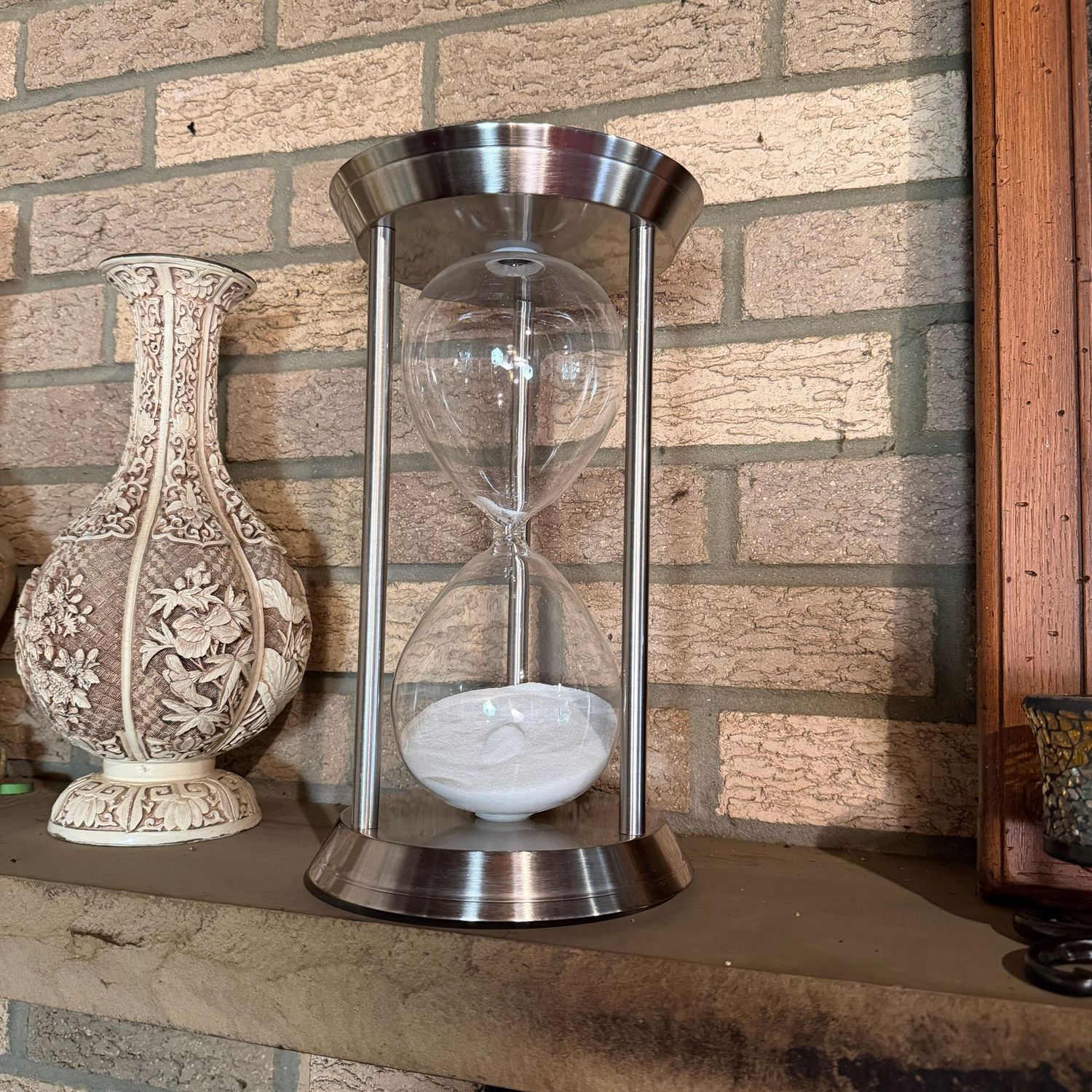 Large hourglass with brushed chrome finish, 12"H