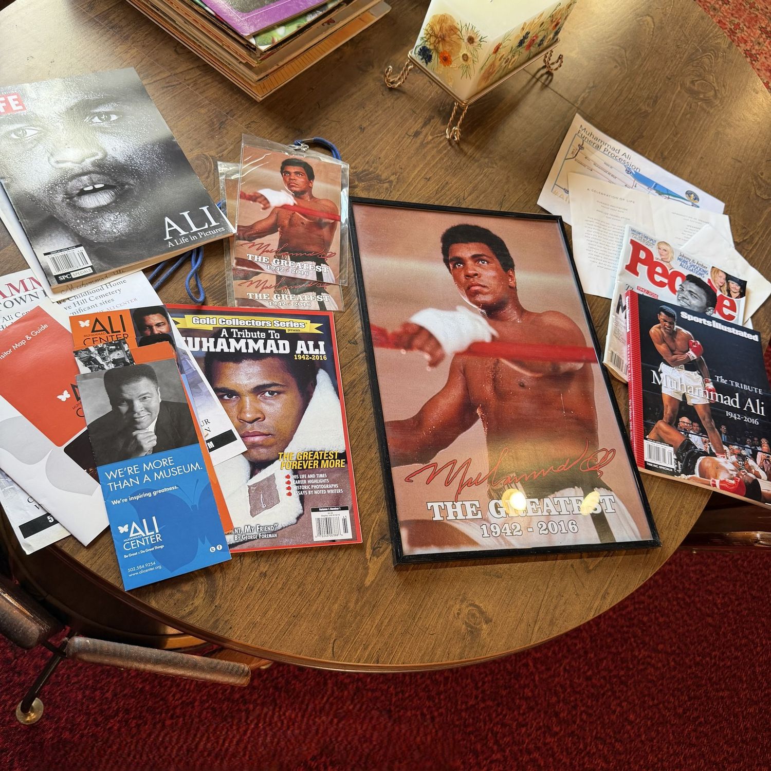 Muhammed Ali collection with brochures, magazines, funeral program, framed poster 19" x 12"
