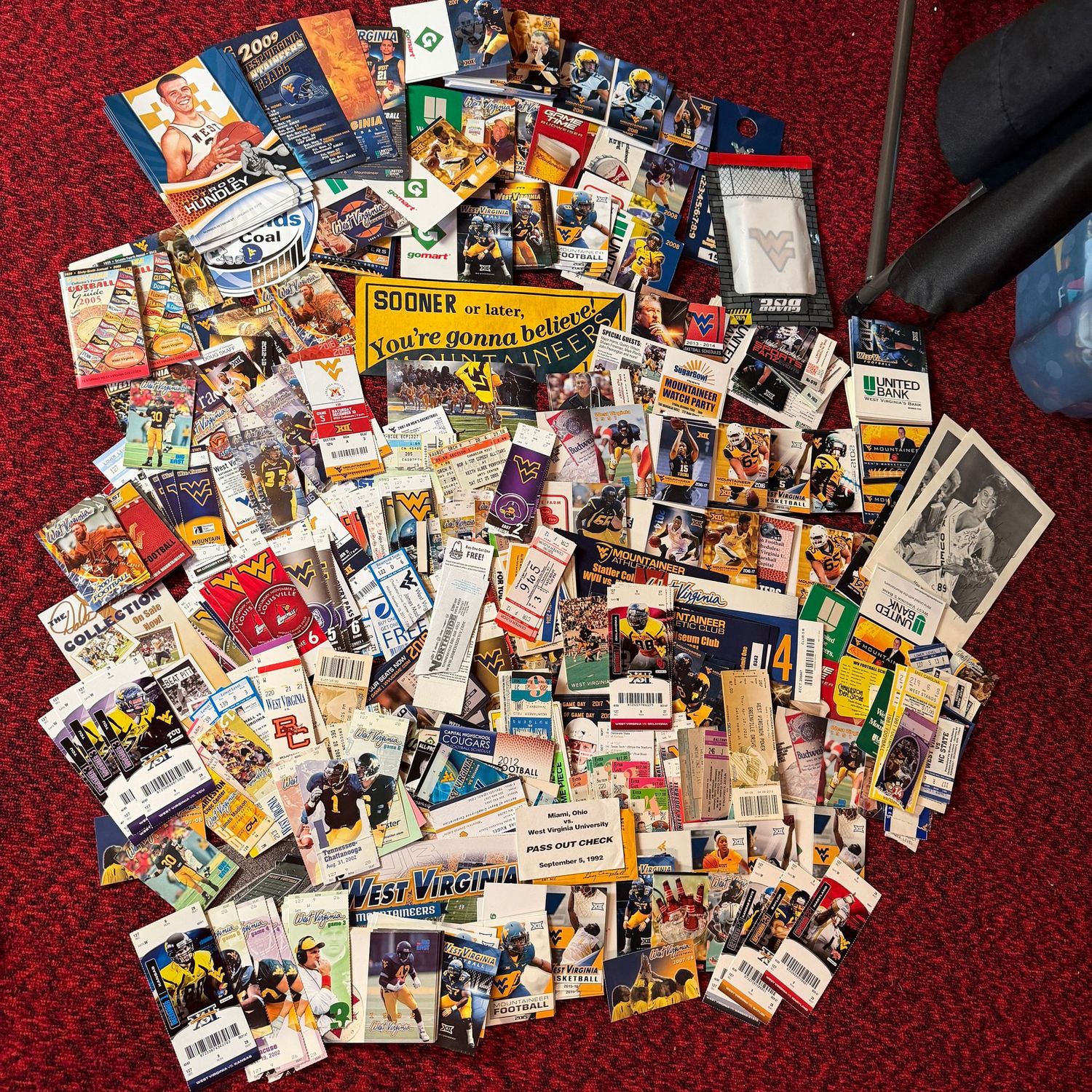 Sports Memorabilia Lot A with years of Mostly WVU team schedules and ticket stubs