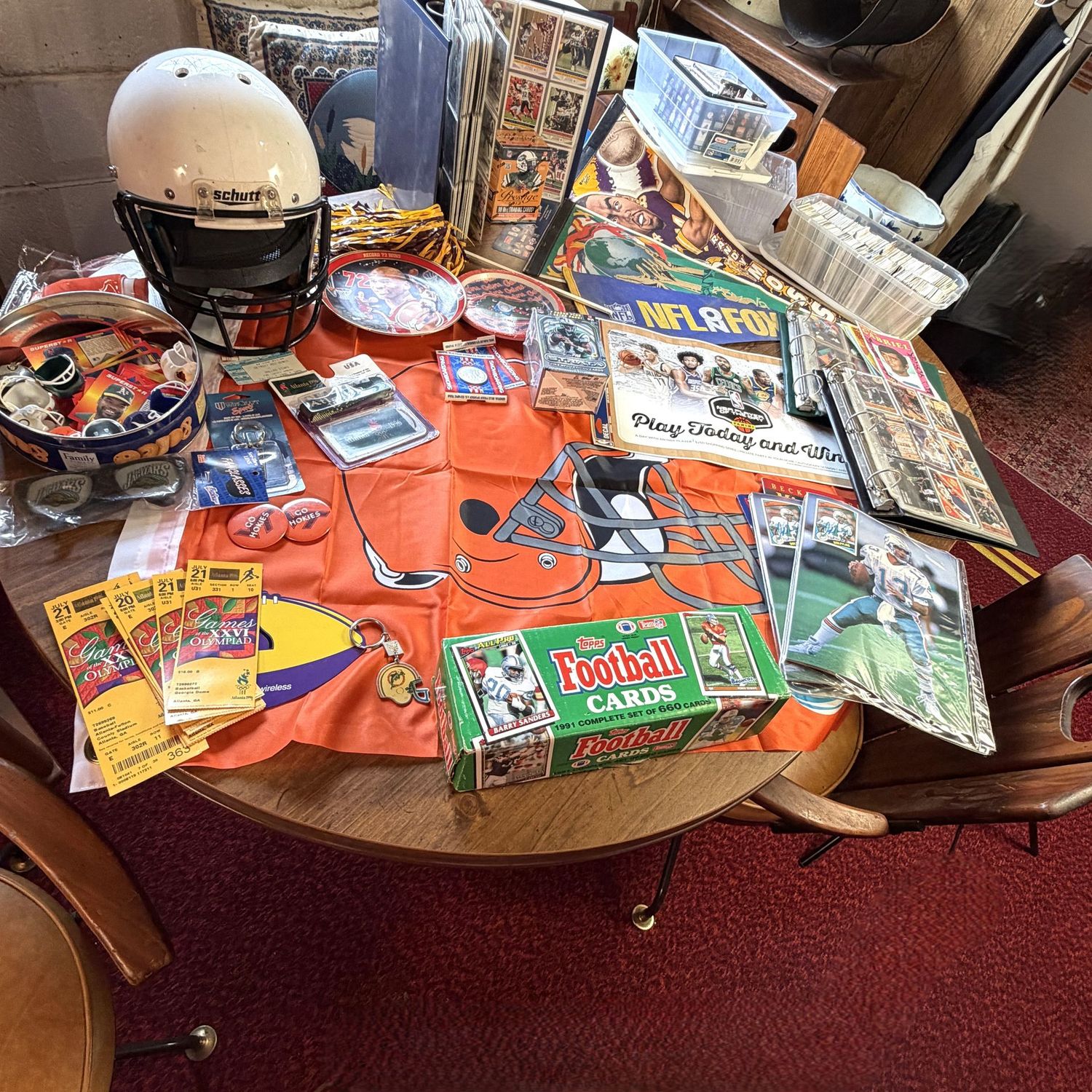 Sports Memorabilia Lot with a Football & Basketball Theme, flag, helmet, trading cards, pennants & more