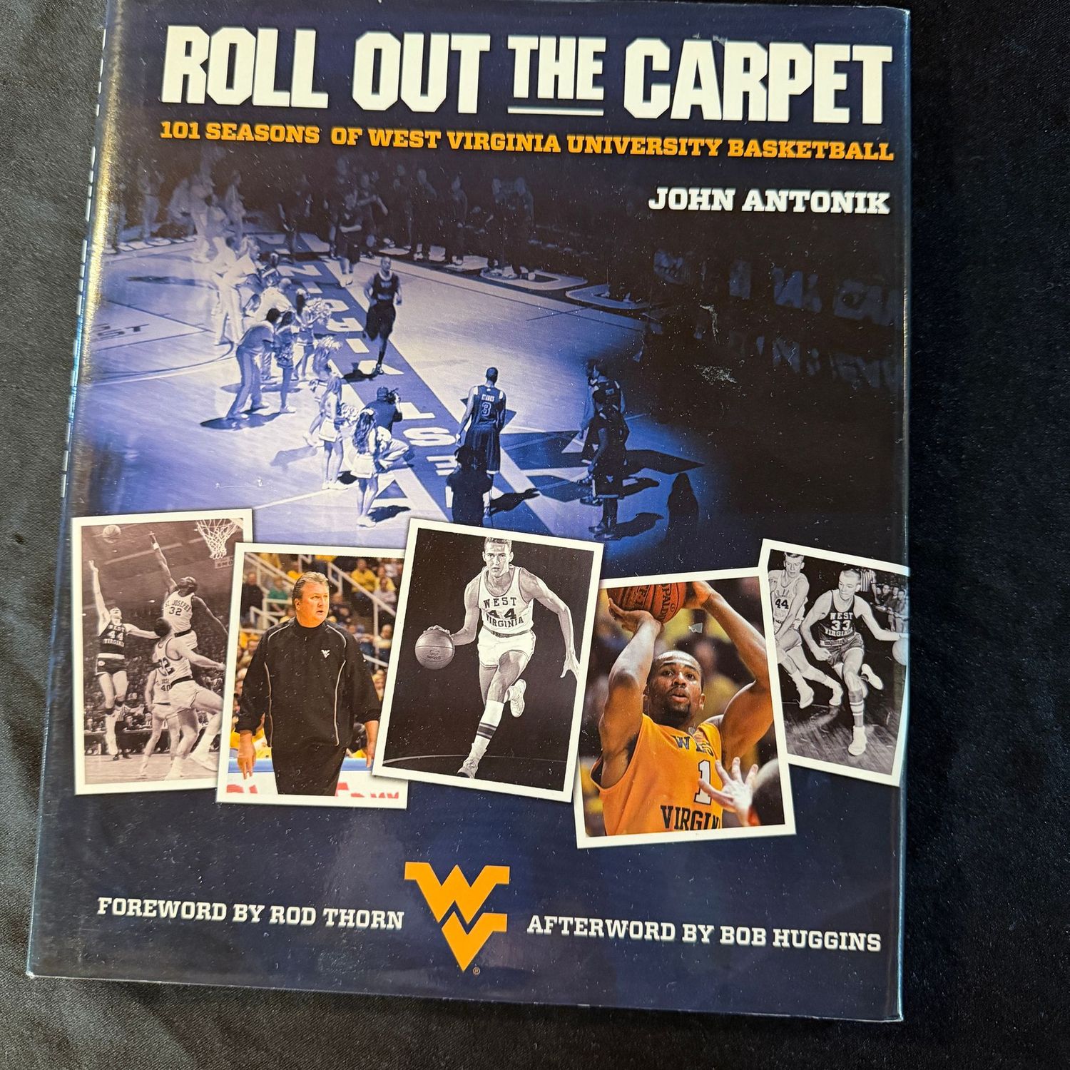 Roll Out the Carpet by John Antonik, signed by Bob Huggins, De'Sean Butler & more