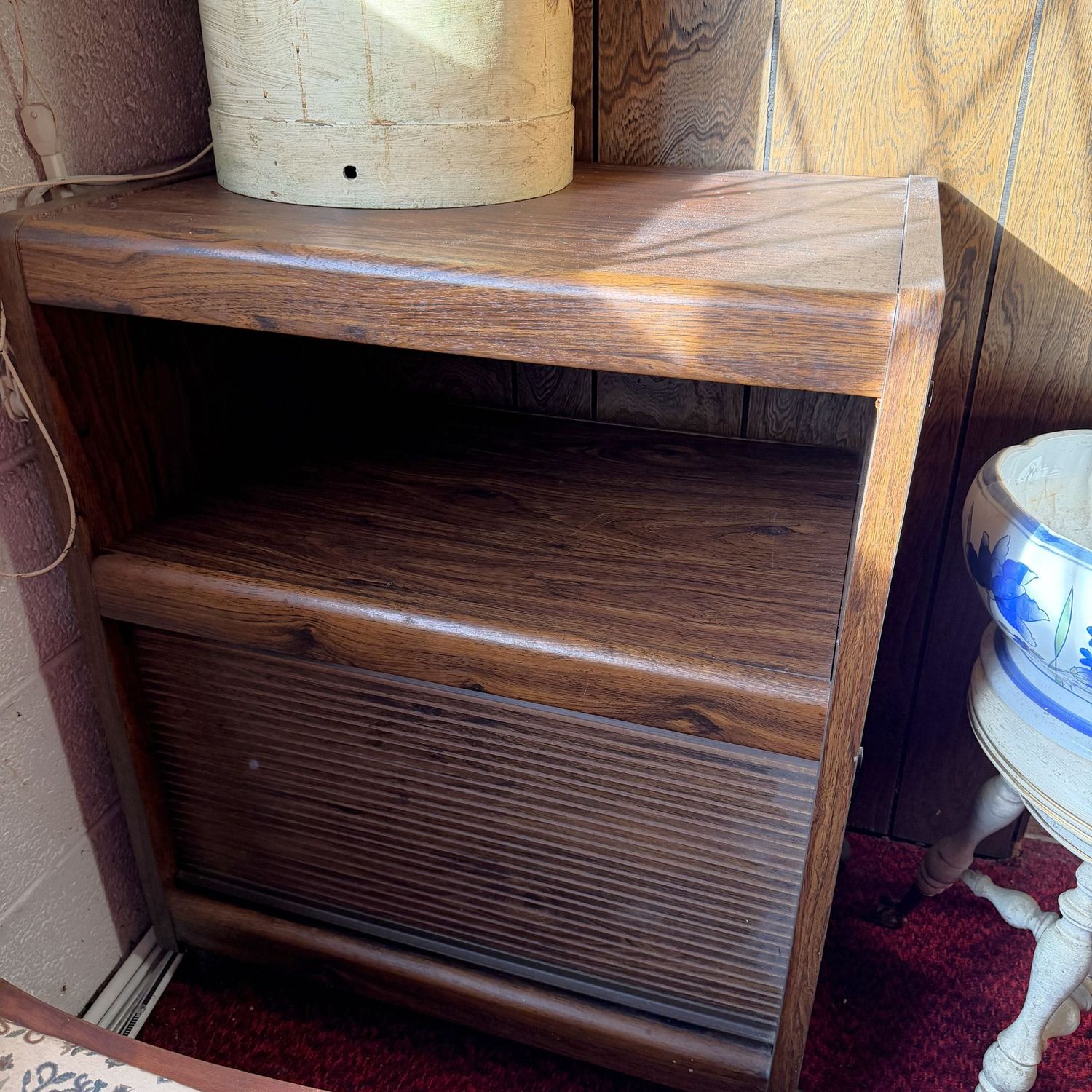 Laminate microwave/printer stand with roll-up storage below, on casters, some wear, (This item is heavy & in the lower level) 33"H x 28"L x 19"D