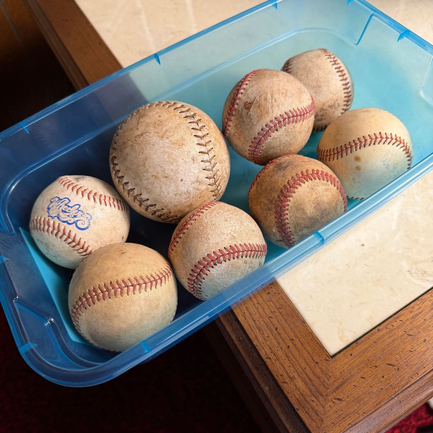 Group of vintage baseballs and softball
