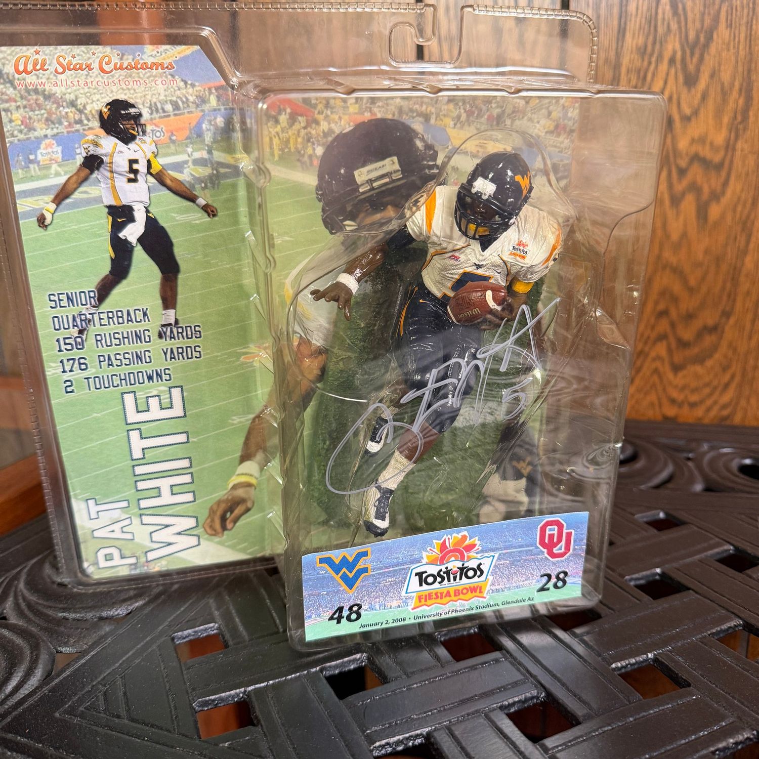 Action Figure B, WVU Pat White action figure in package, signed, Fiesta Bowl