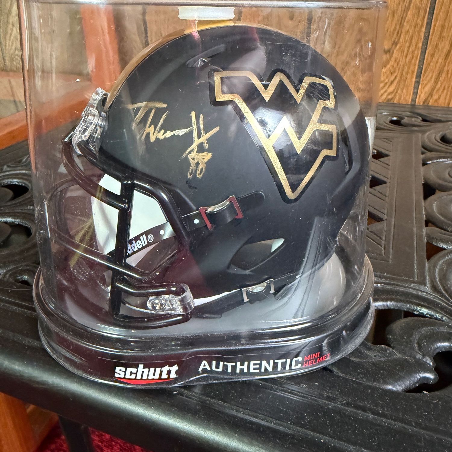 Mini football helmet #2, Black WVU Schutt mini helmet, 5"H, signed by Trevon Wesco, JSA certified