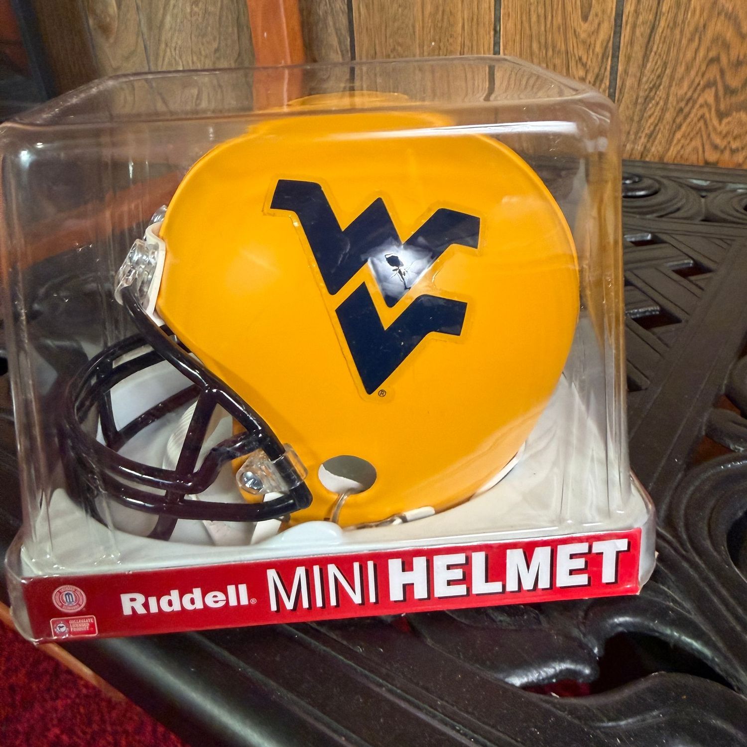 Riddell mini helmet, 5"H, WVU blue and gold (one sticker has a corner lifting off)