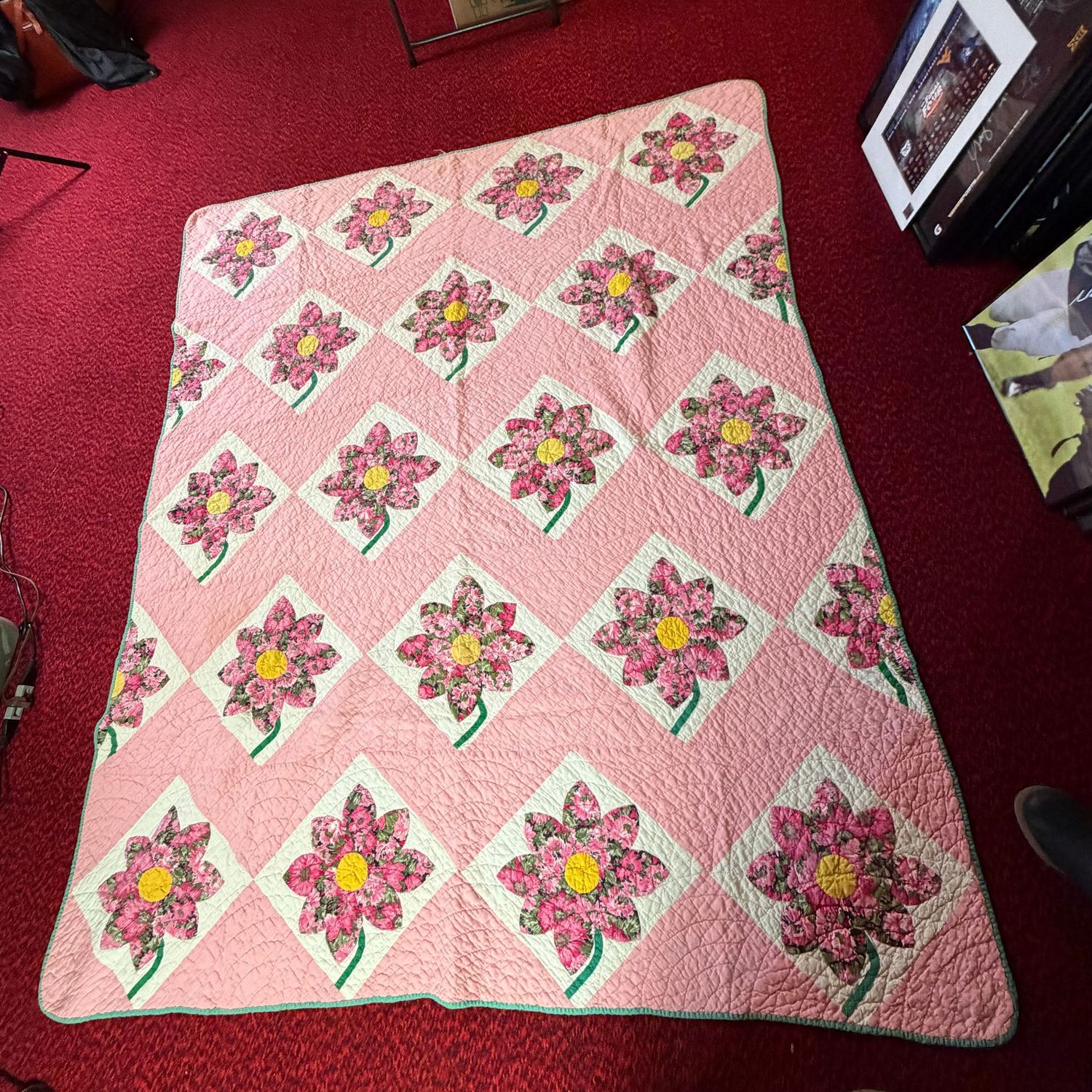 Pale pink floral handmade quilt, minor wear to a few edges, 62" x  76"