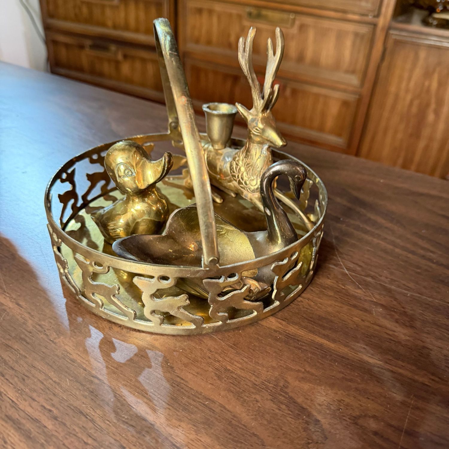Brass basket with duck, reindeer candle holder, and swan trinket dish, basket is 8"W