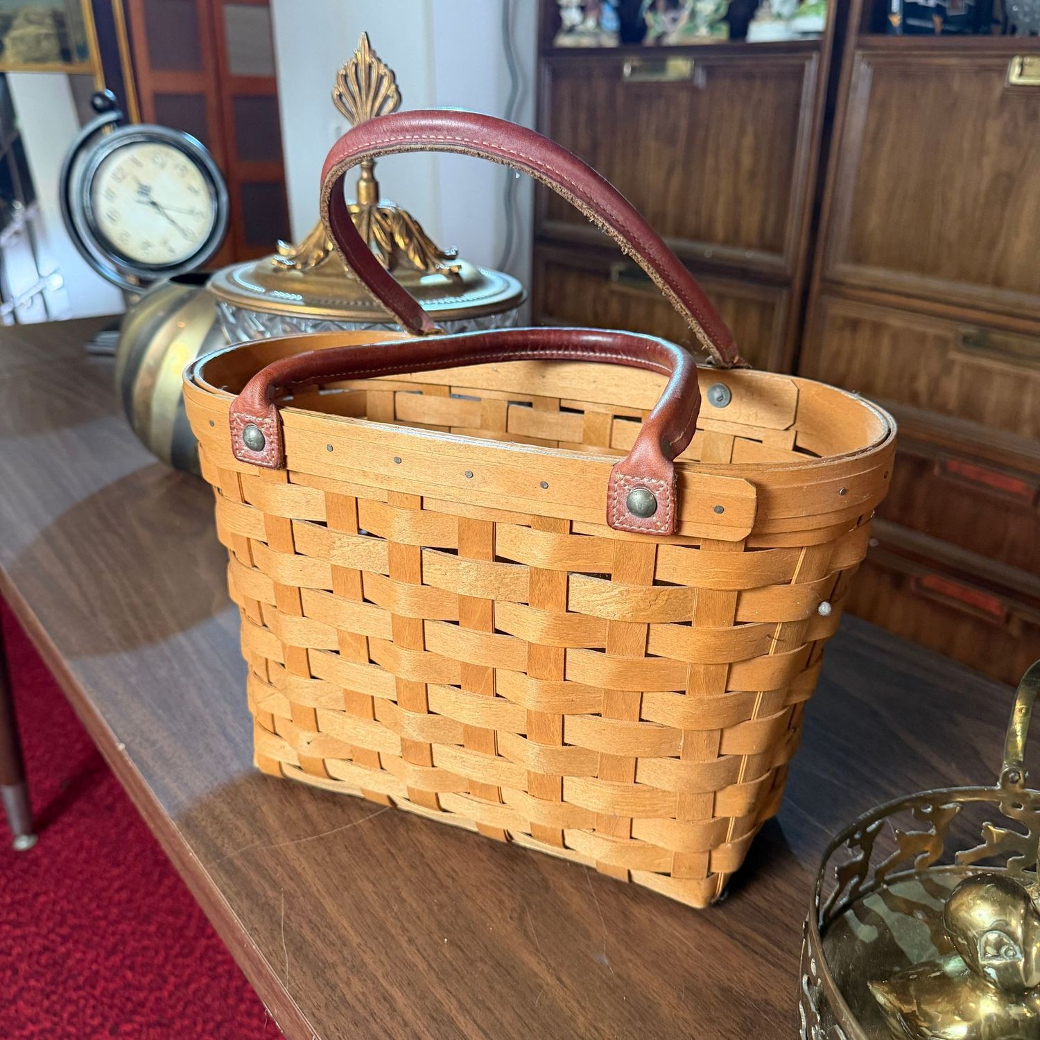 Longaberger basket with leather handles, minor wear, 8"H x 12"L
