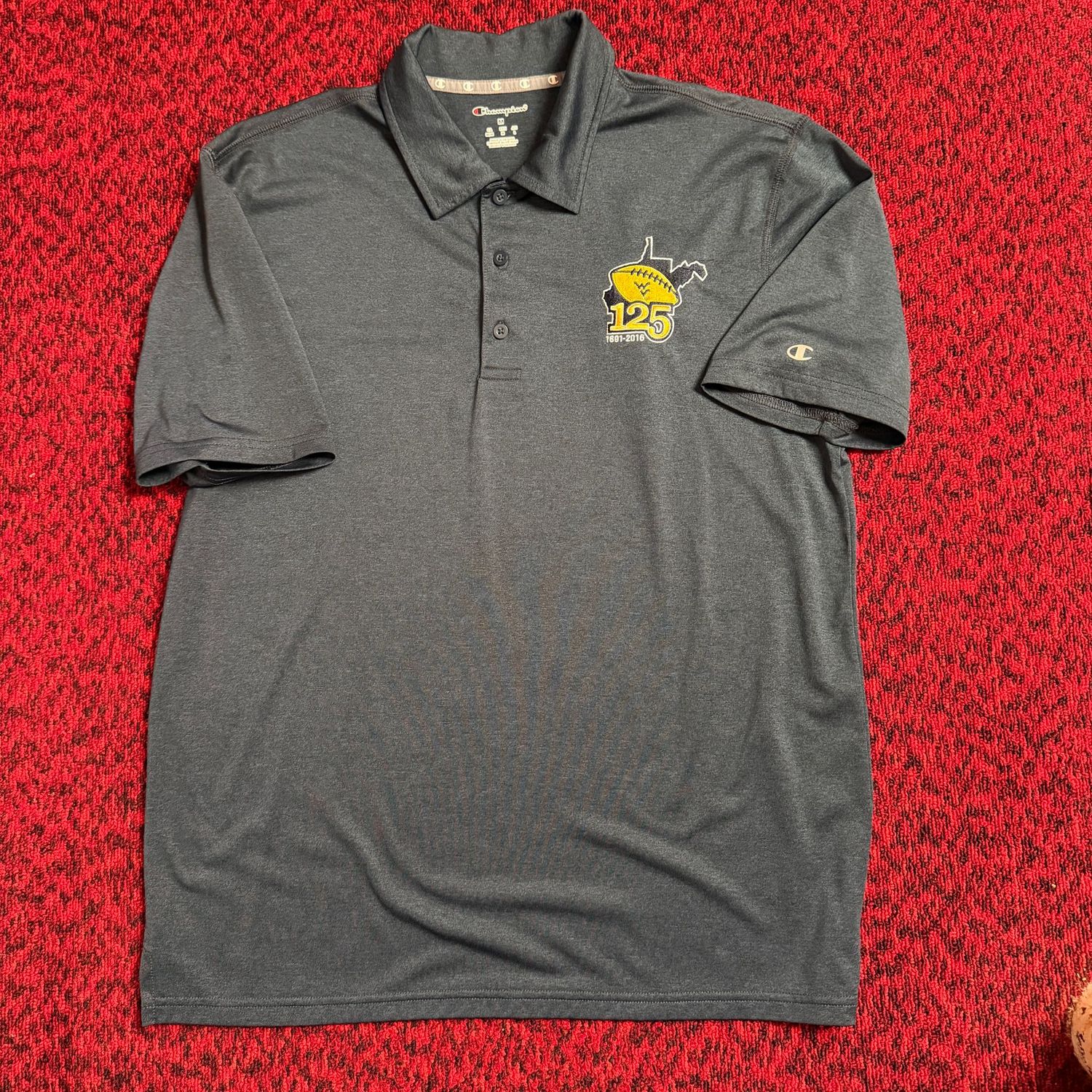 WVU Champion polo shirt, dark grey with embroidered WVU football over state with 125, size M